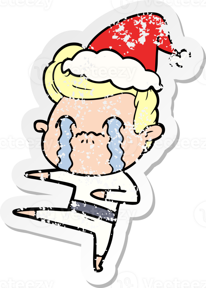 hand drawn distressed sticker cartoon of a man crying wearing santa hat png