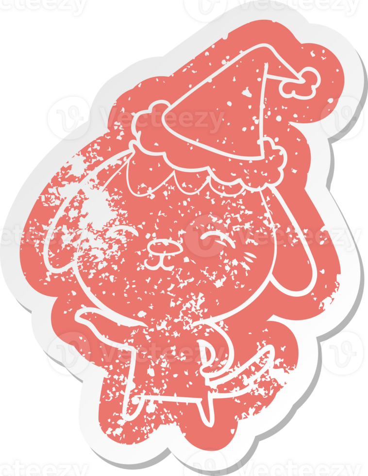 happy quirky cartoon distressed sticker of a dog wearing santa hat png