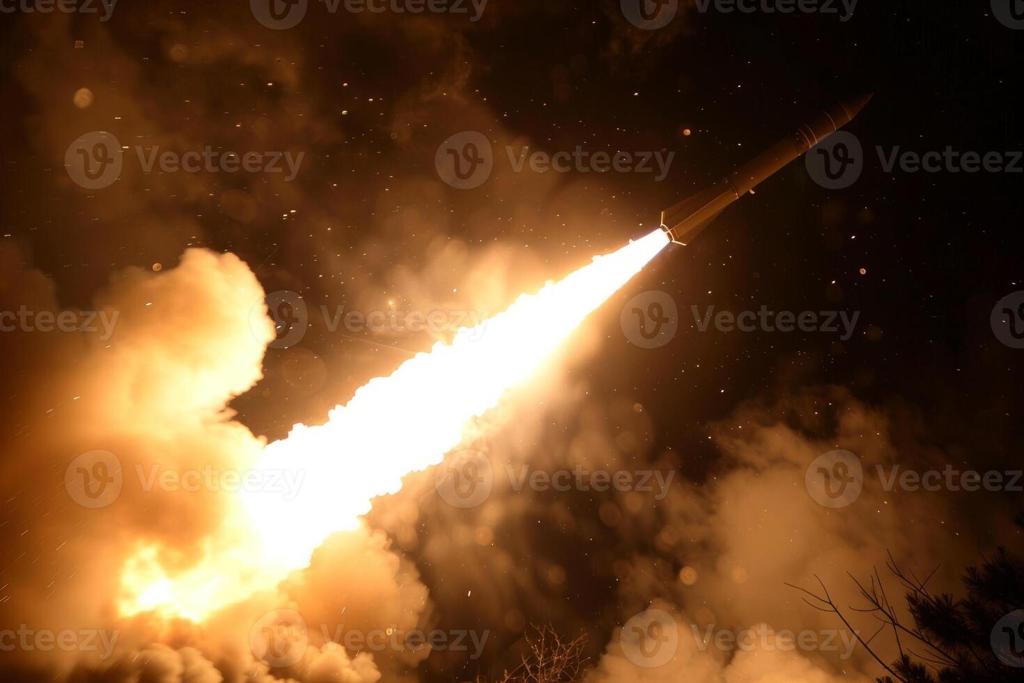 Long range rocket launch at night with fiery exhaust trail and smoke plumes. Concept of space exploration, military power or scientific research photo