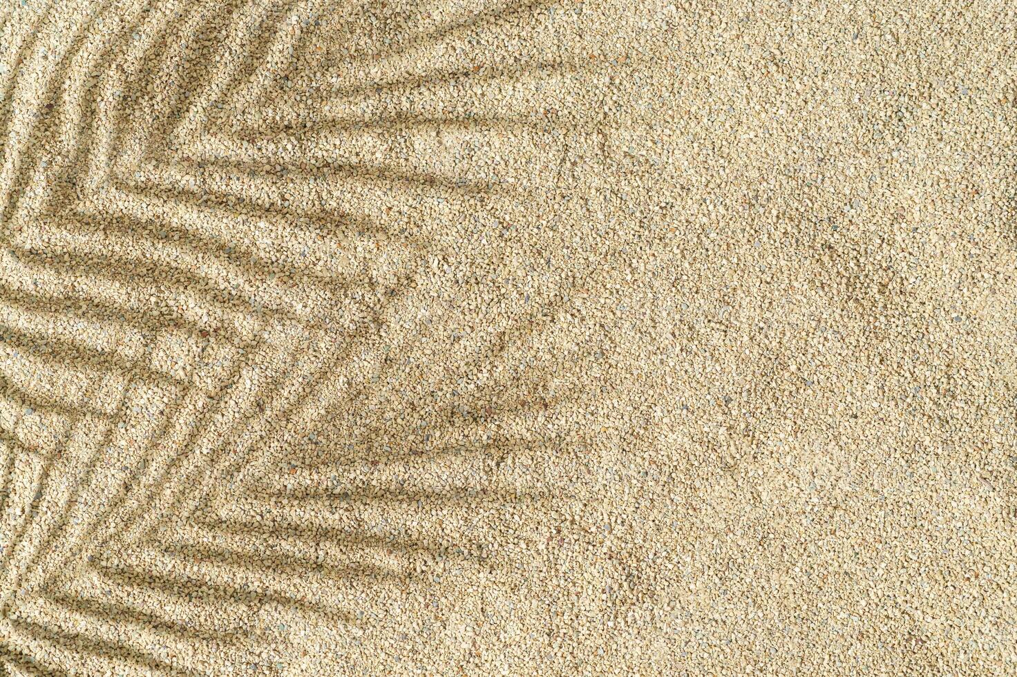 Tropical palm tree leaves shadow on beach sand background. Minimal summer concept. An original background image with a play of light and shadow. Creative copy space. Summer aesthetic. Exotic flat lay. photo