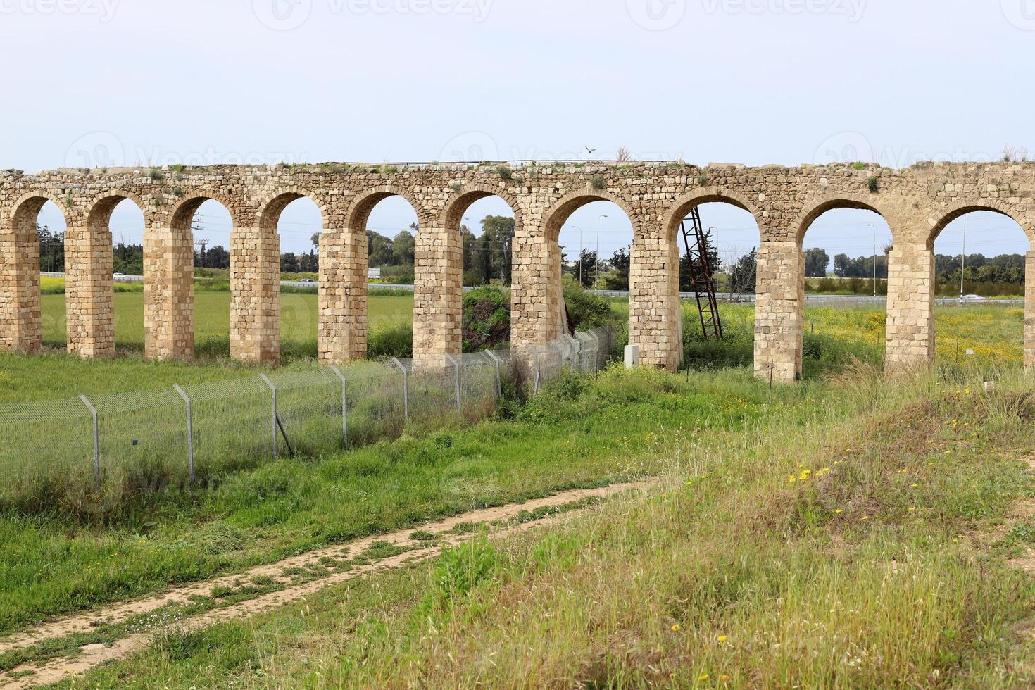 An ancient aqueduct for supplying water to populated areas. photo