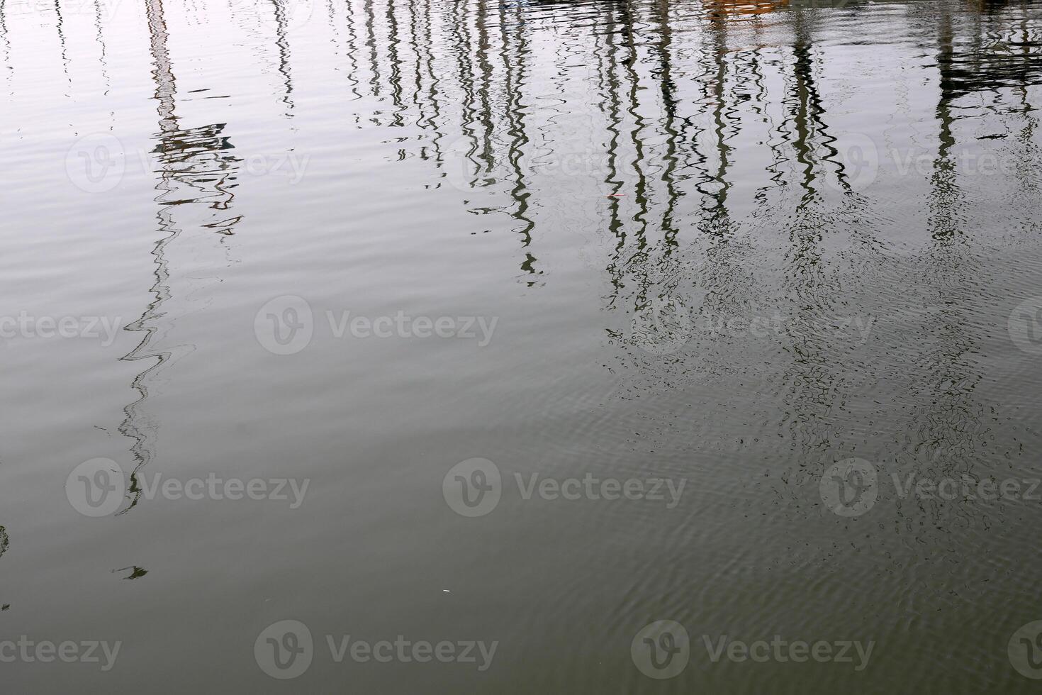 The color of water in the Mediterranean Sea in shallow water. Natural abstract background. photo