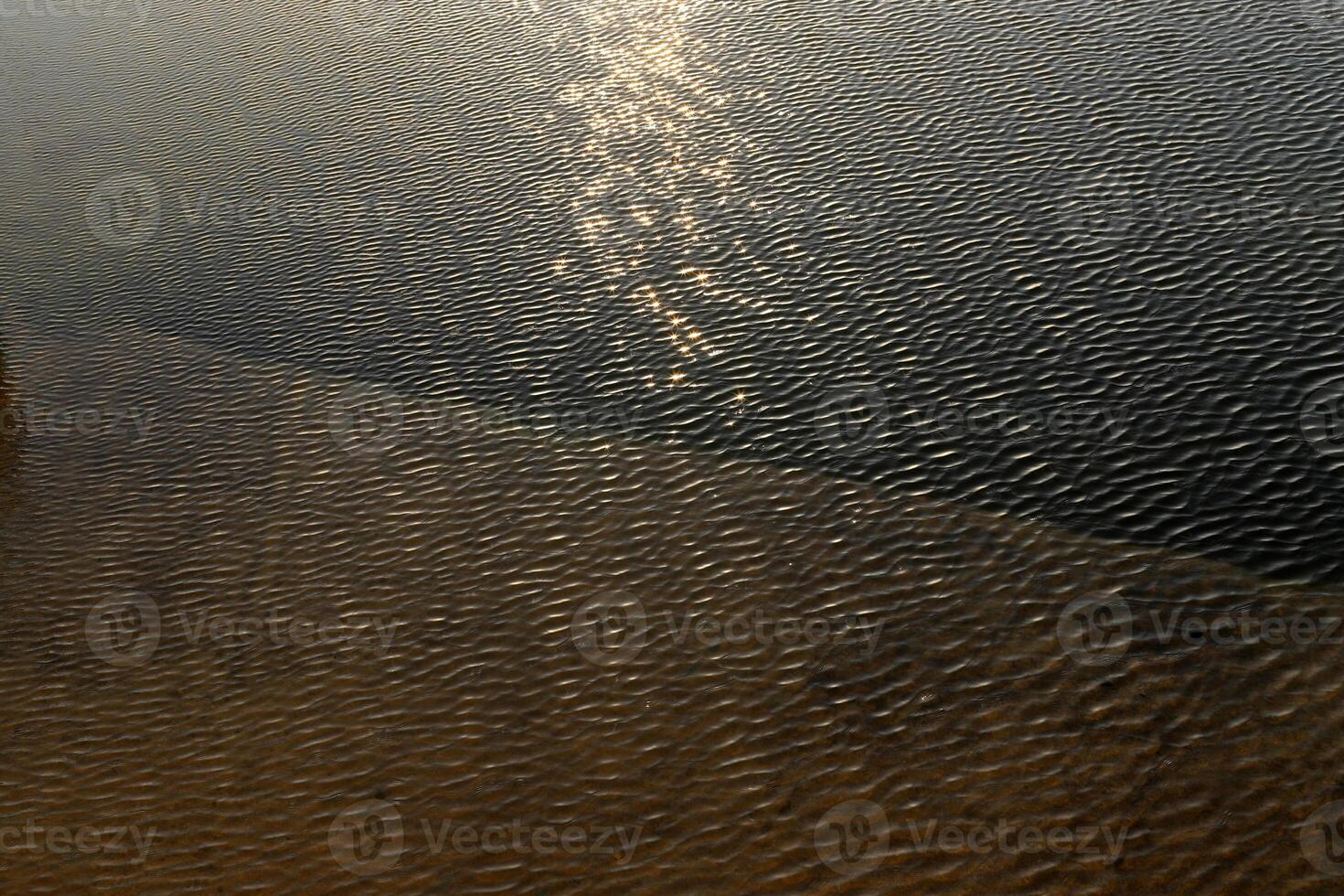 The color of water in the Mediterranean Sea in shallow water. Natural abstract background. photo