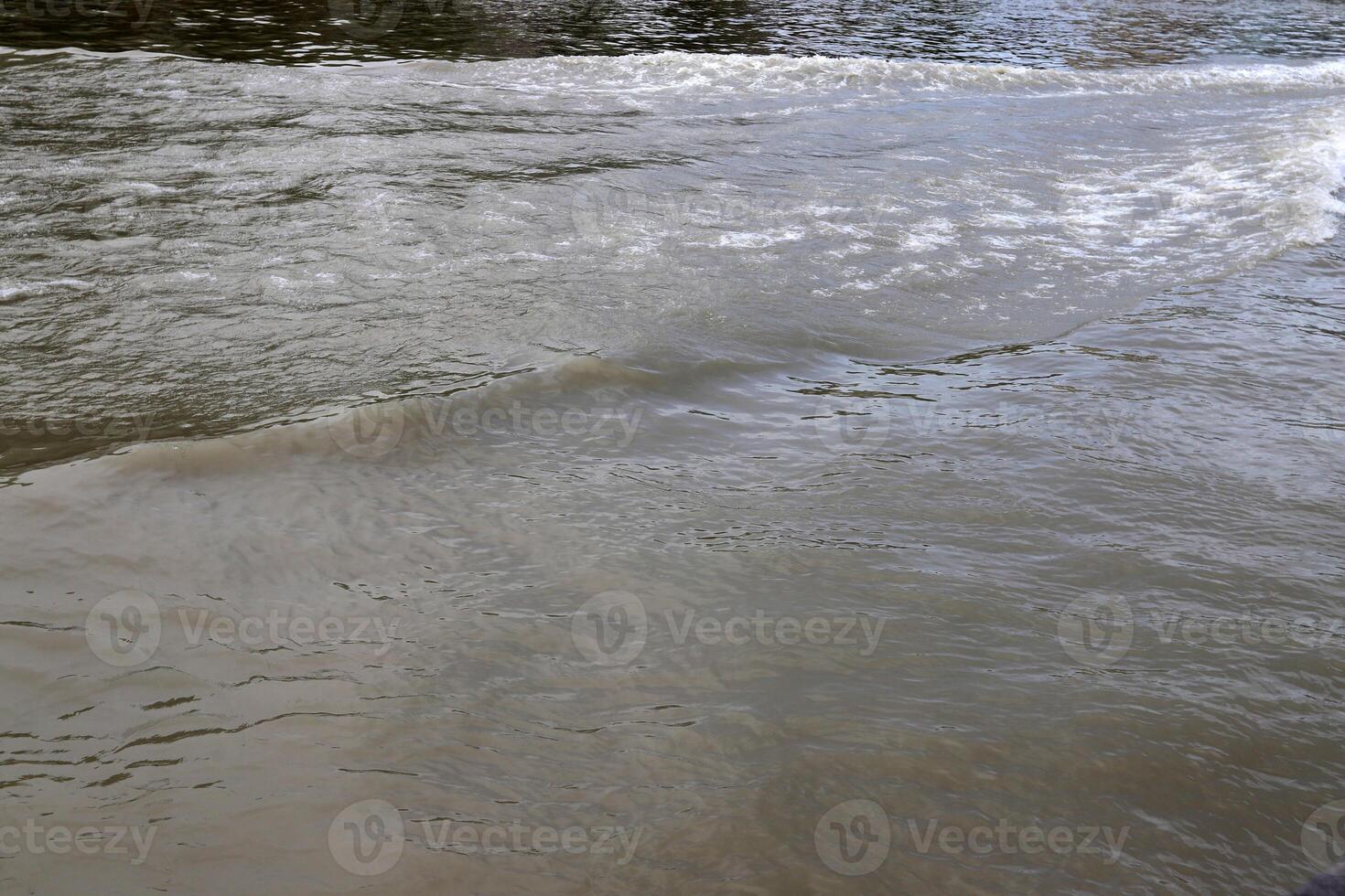 The color of water in the Mediterranean Sea in shallow water. Natural abstract background. photo