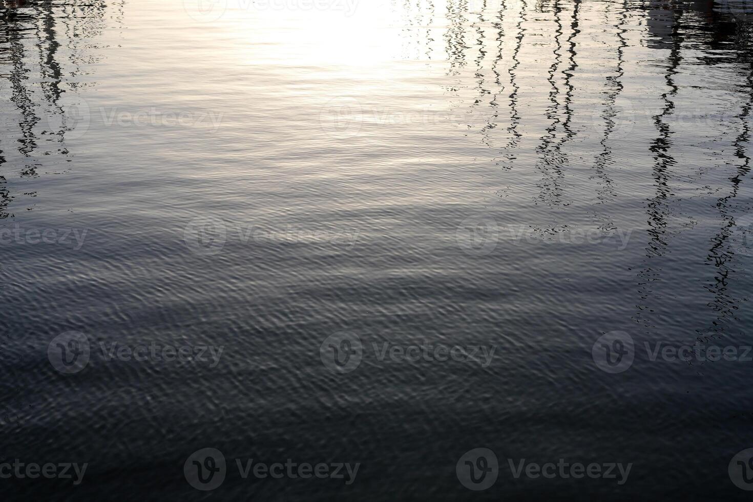 The color of water in the Mediterranean Sea in shallow water. Natural abstract background. photo