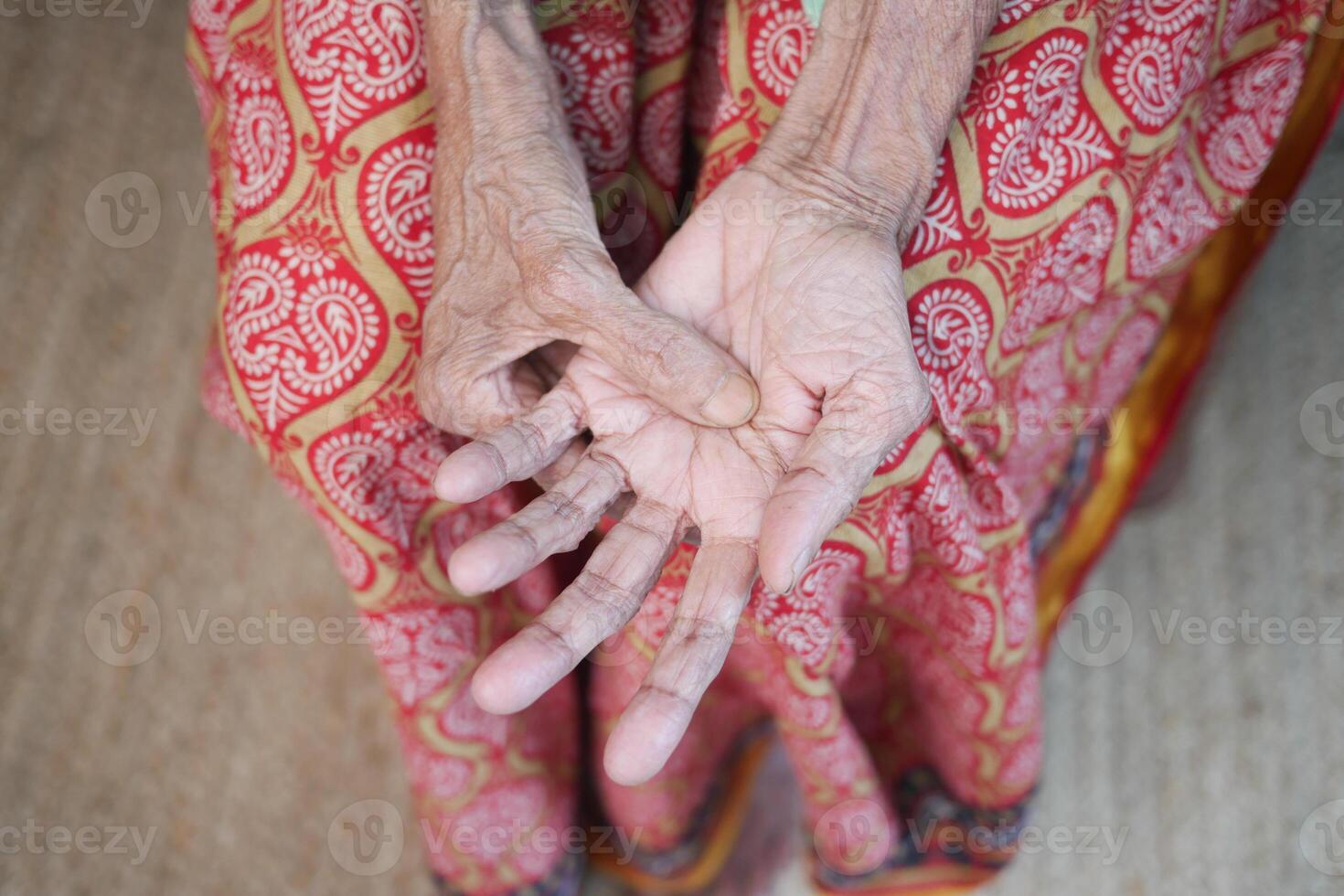 Elderly woman suffering from pain. photo