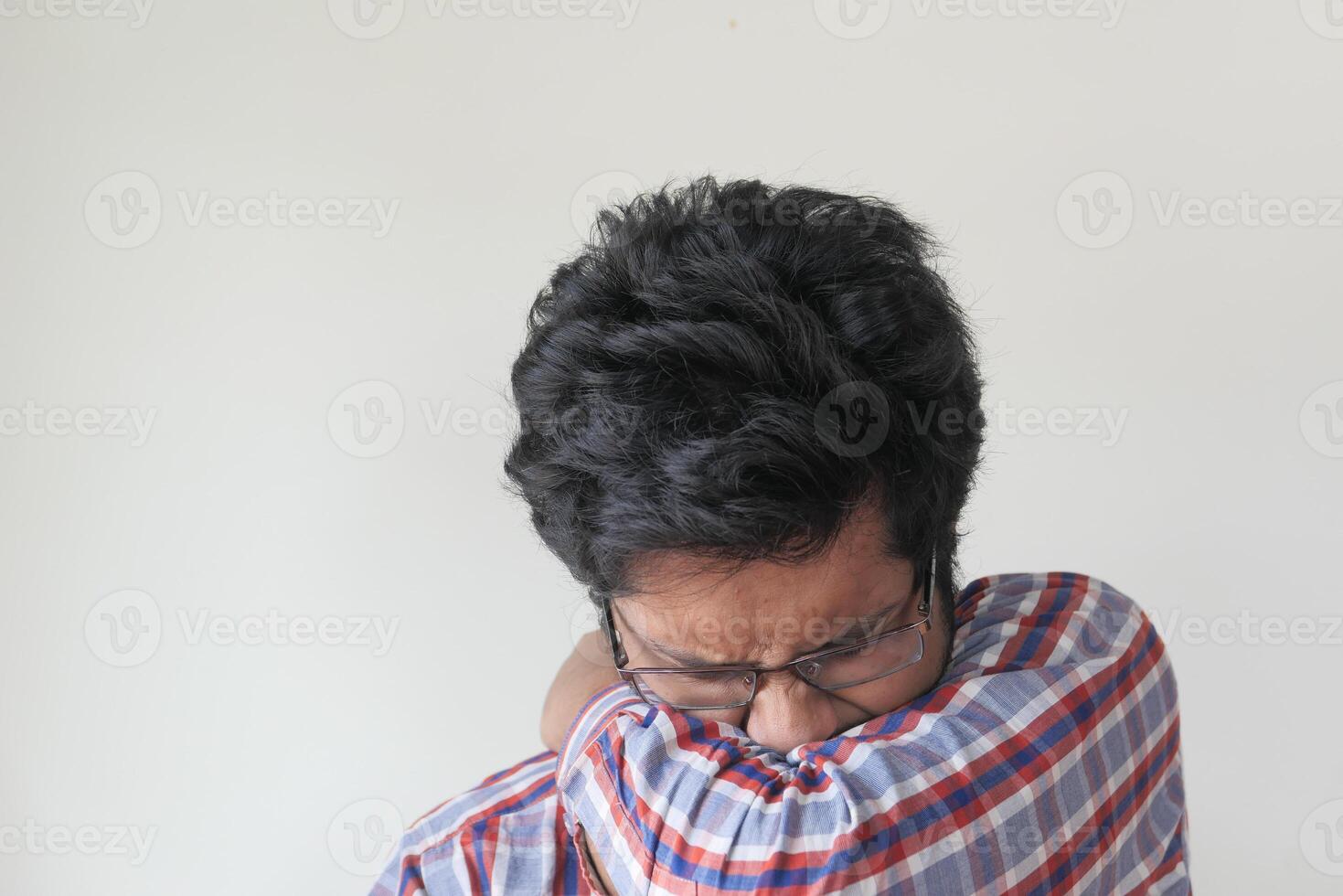 sick man covering mouth and nose with arm, Concept of stop spread of the virus photo
