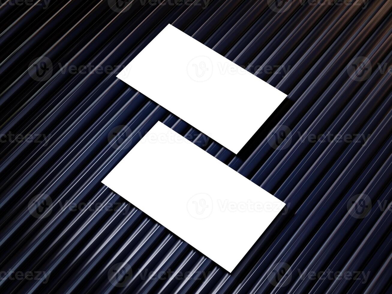 Closeup of empty white rectangle business card mockups lying diagonally on metallic blue background. Flat lay, top view. Open composition. Blank Template for Corporate Identity. Copy space. photo