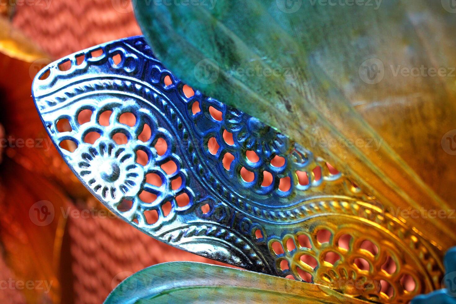 Colorful Close Up of Metal Flower Garden Ornament photo