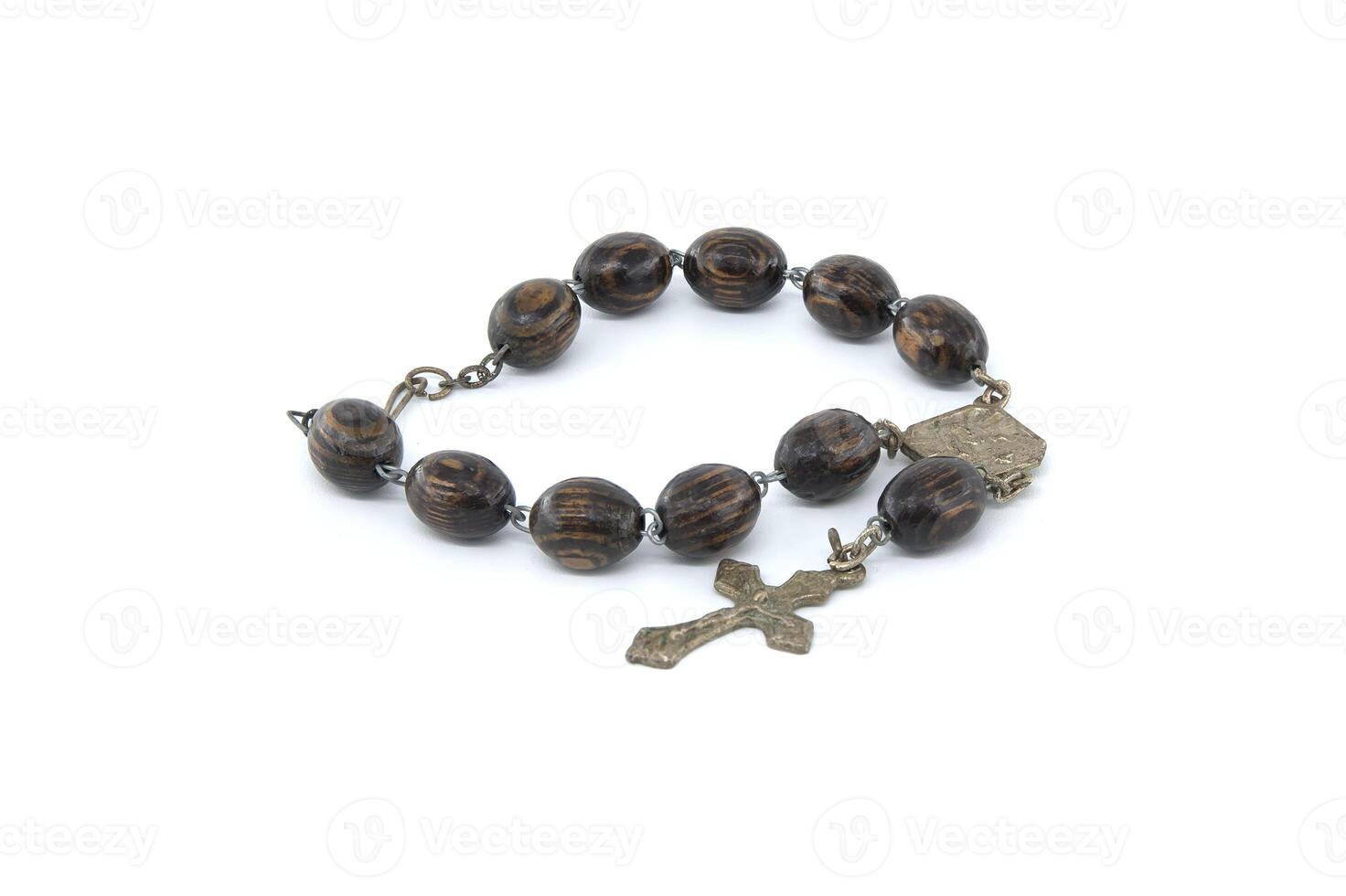 Rosary with wooden beads isolated on white background photo