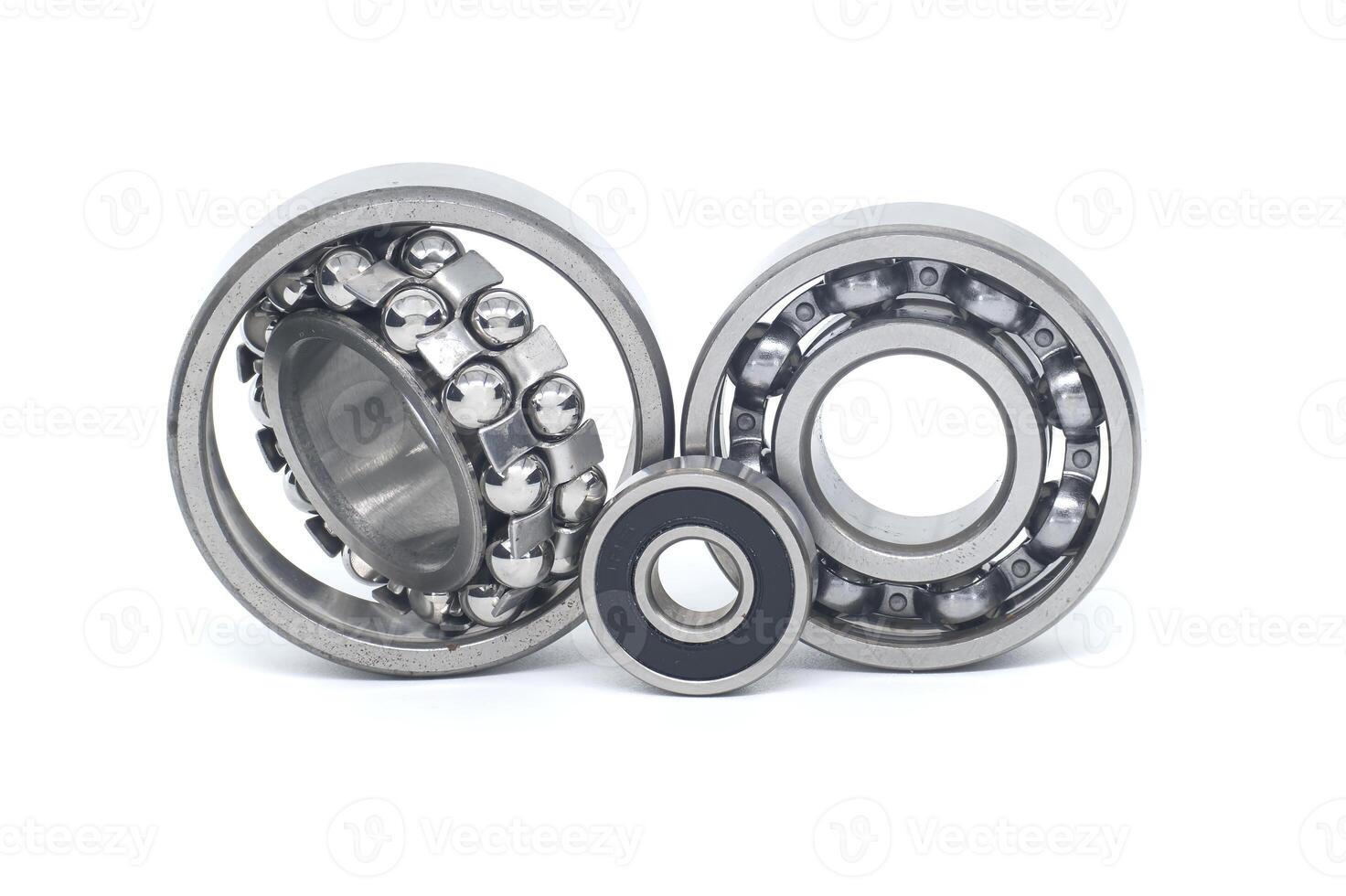 Bearings of varying sizes and types isolated on white background photo