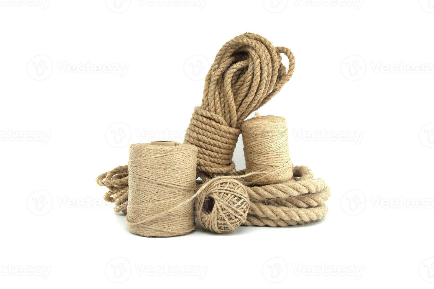 Jute ropes and twines isolated on white background photo
