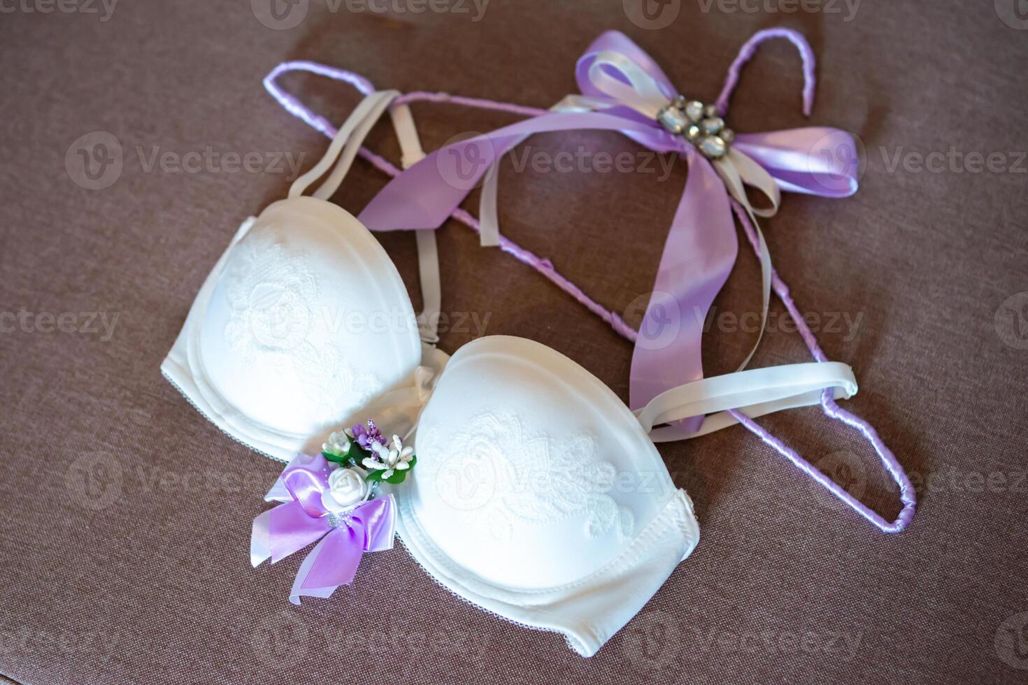 bride's linen white bra on the hanger photo