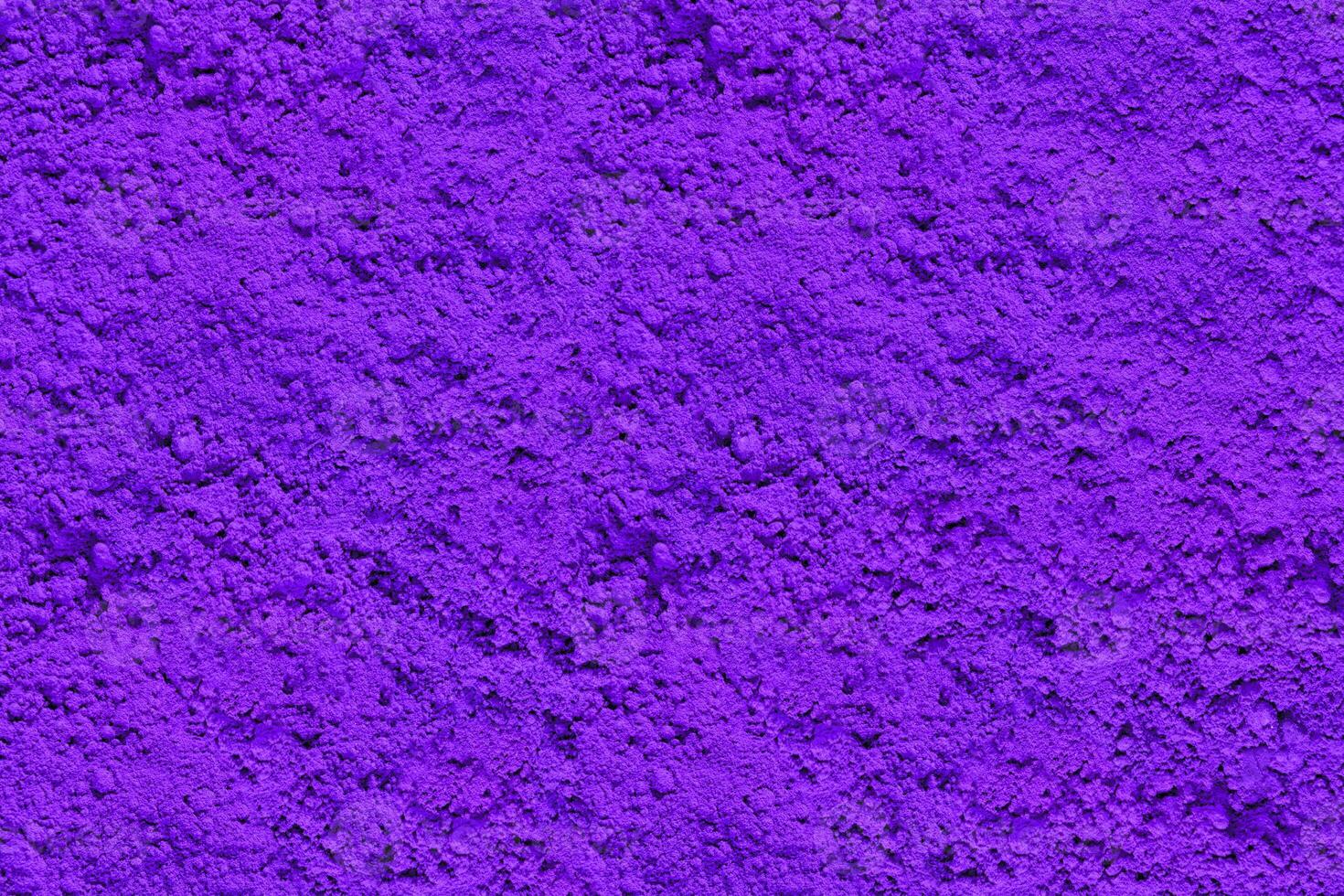 purple texture for background design. natural purple pigment top view. photo