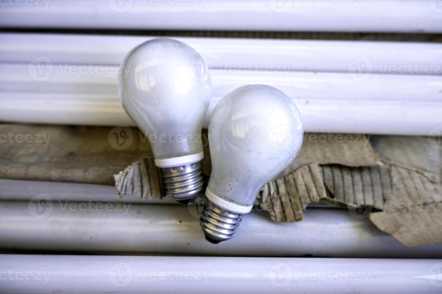 Old light bulbs in the trash 45361900 Stock Photo at Vecteezy