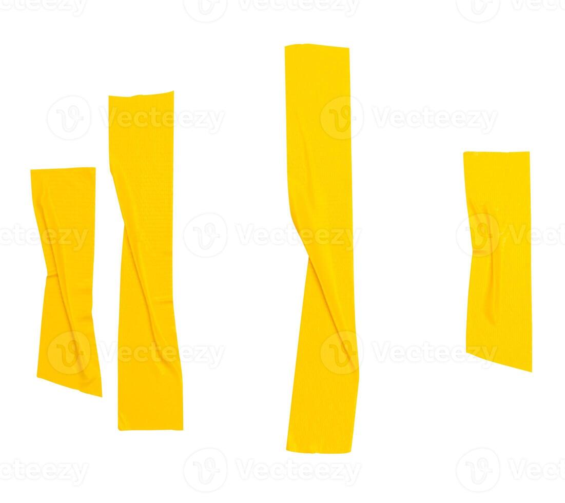 Top view set of wrinkled yellow adhesive vinyl tape or cloth tape in stripes shape isolated on white background with clipping path photo