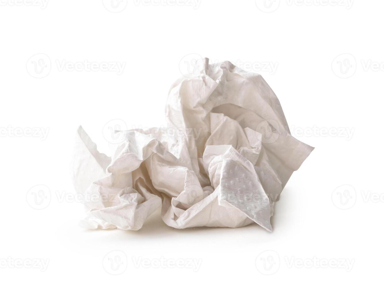 Front view of screwed or crumpled tissue paper ball after use in toilet or restroom isolated on white background with clipping path photo