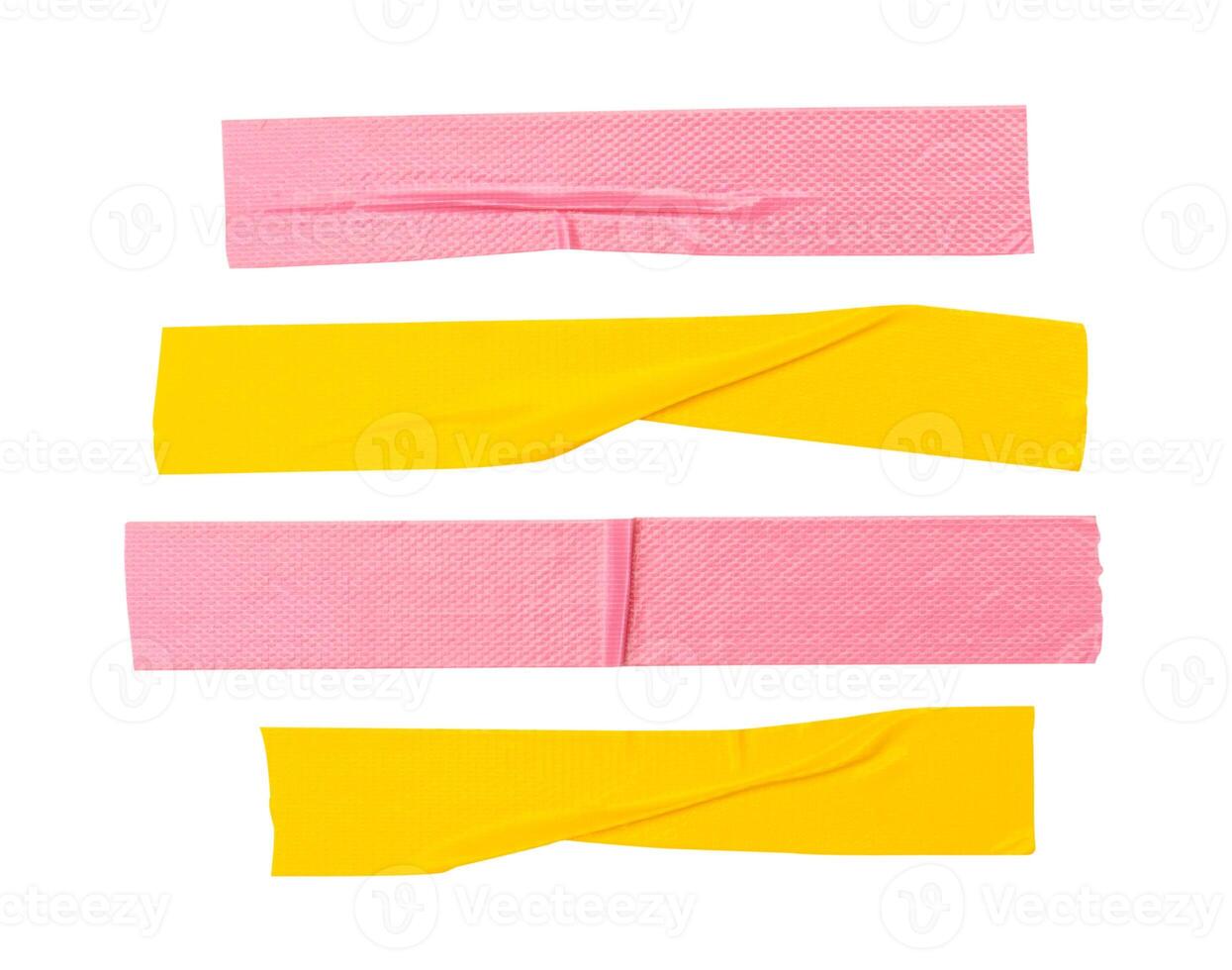 Top view set of wrinkled yellow and pink adhesive vinyl tape or cloth tape in stripes shape isolated on white background with clipping path photo