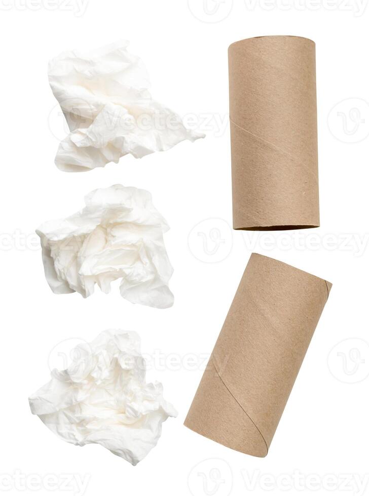 Top view set of screwed or crumpled tissue paper balls with cores after use in toilet or restroom isolated on white background with clipping path photo