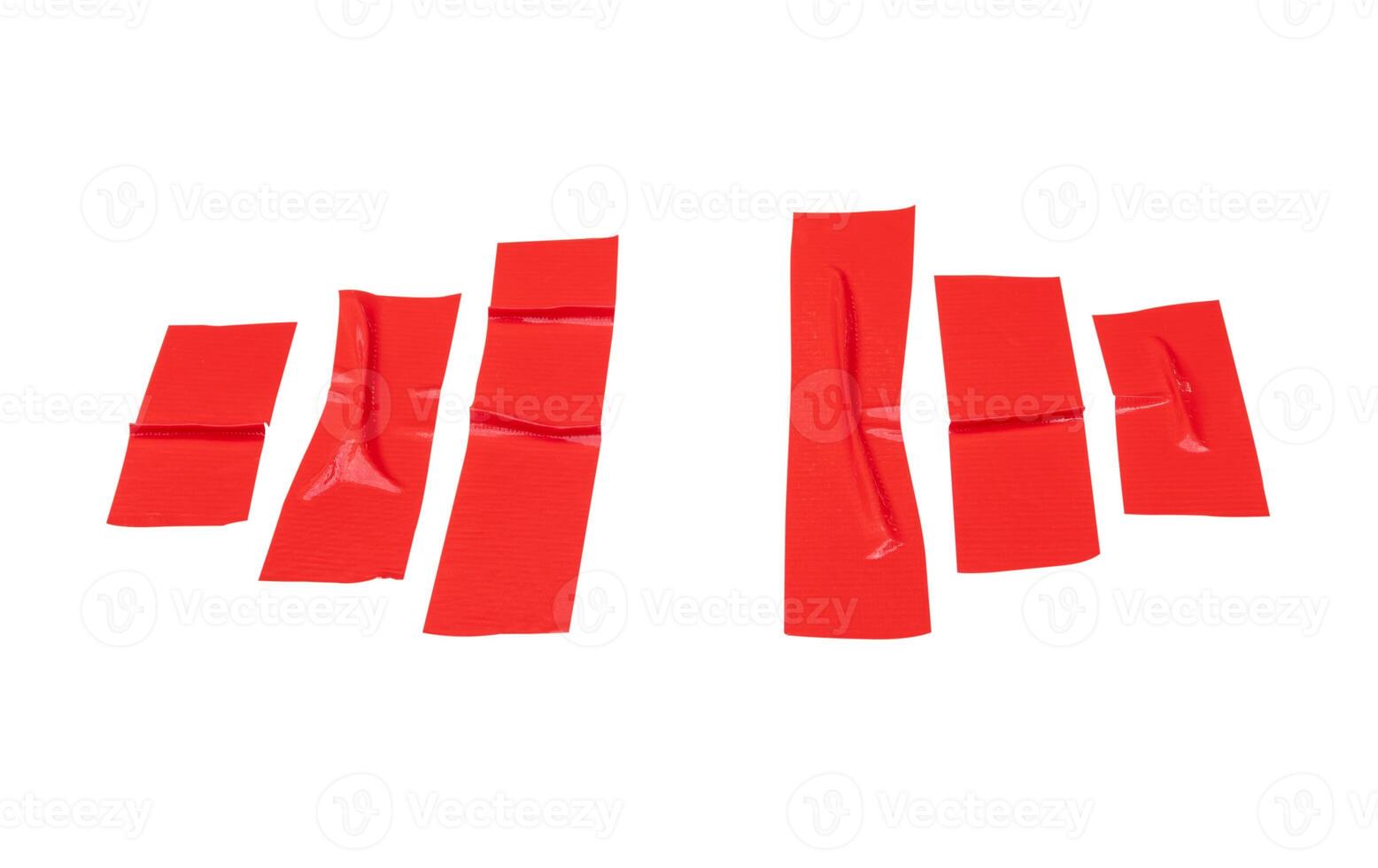 Top view set of wrinkled red adhesive vinyl tape or cloth tape in stripes isolated on white background with clipping path photo