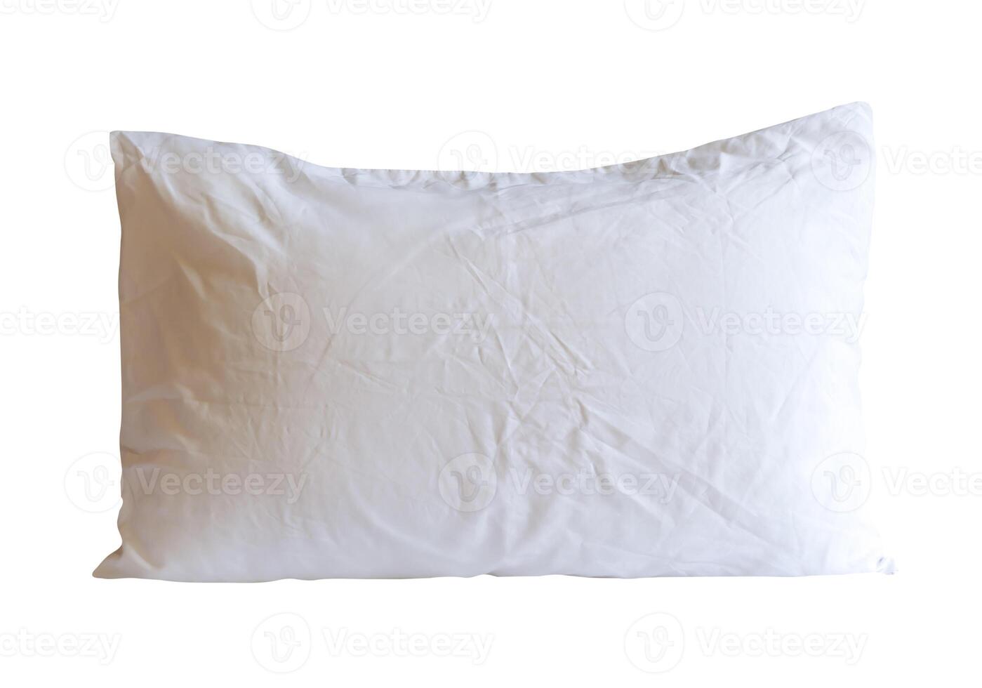 Top view of white pillow with case after guest's use in hotel or resort room isolated on white background with clipping path. Concept of comfortable and happy sleep in daily life photo