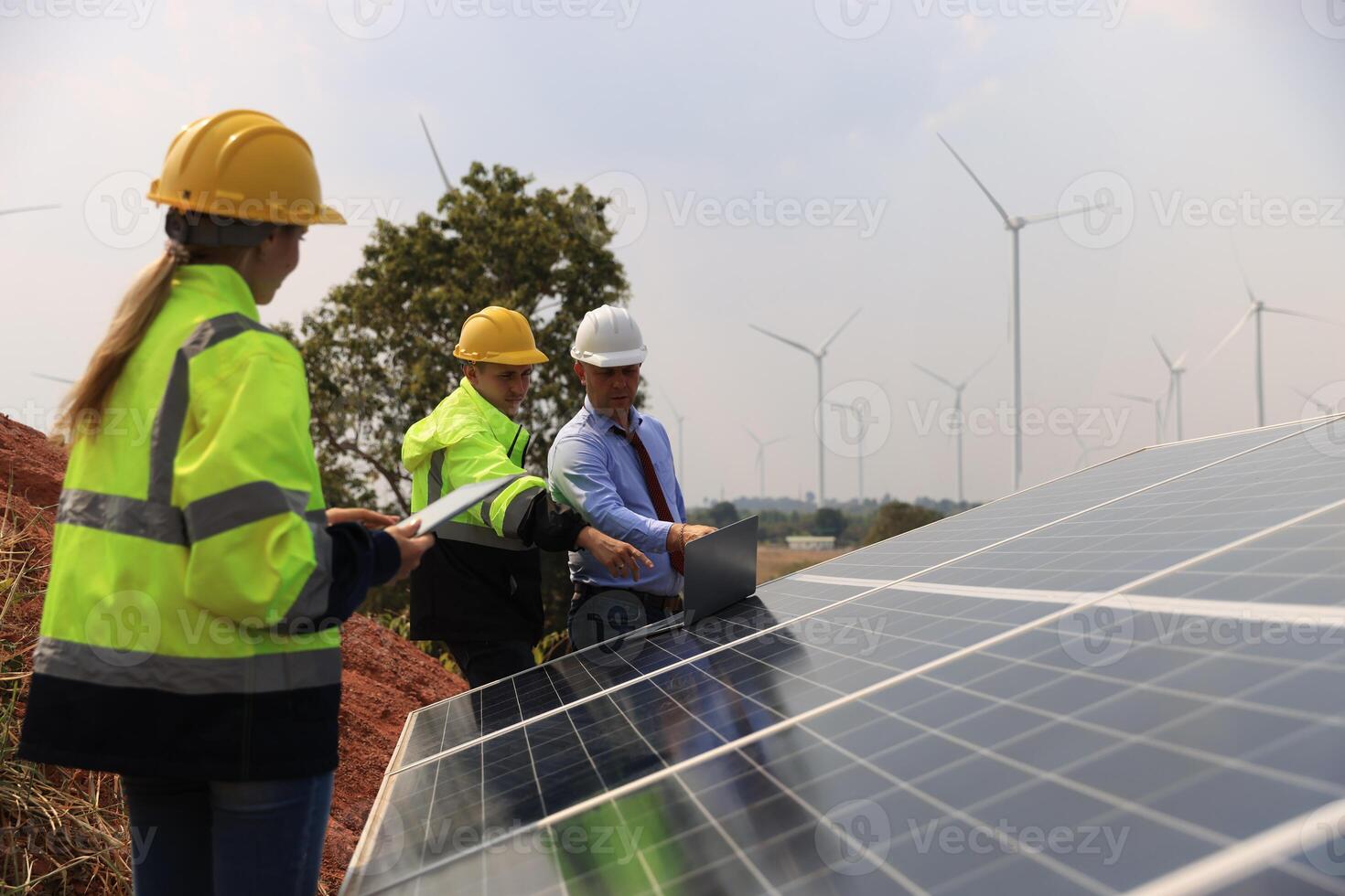 Businessman or owner check job progress of solar panel installation, sustainable and renewable energy, business discussion photo