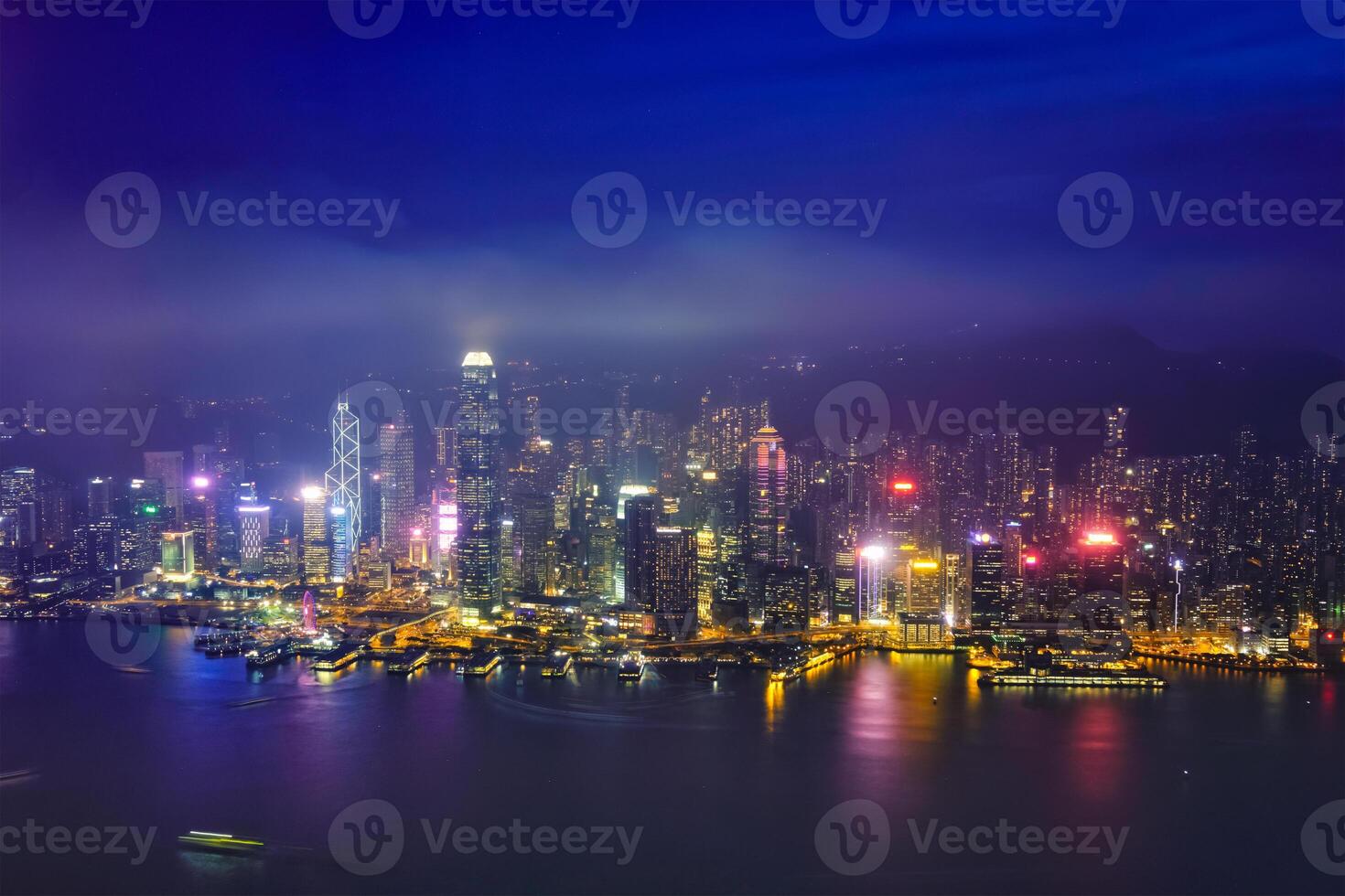 Aerial view of illuminated Hong Kong skyline. Hong Kong, China photo