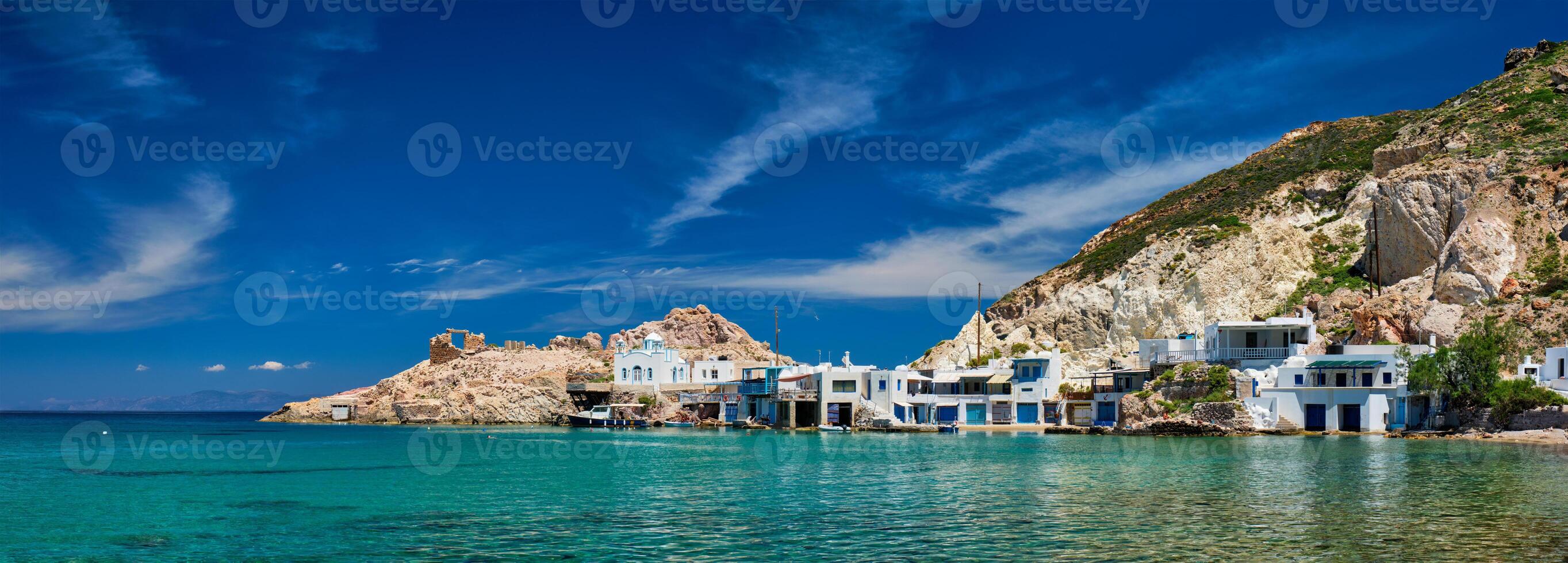The beach of Firapotamos in Milos, Greece photo