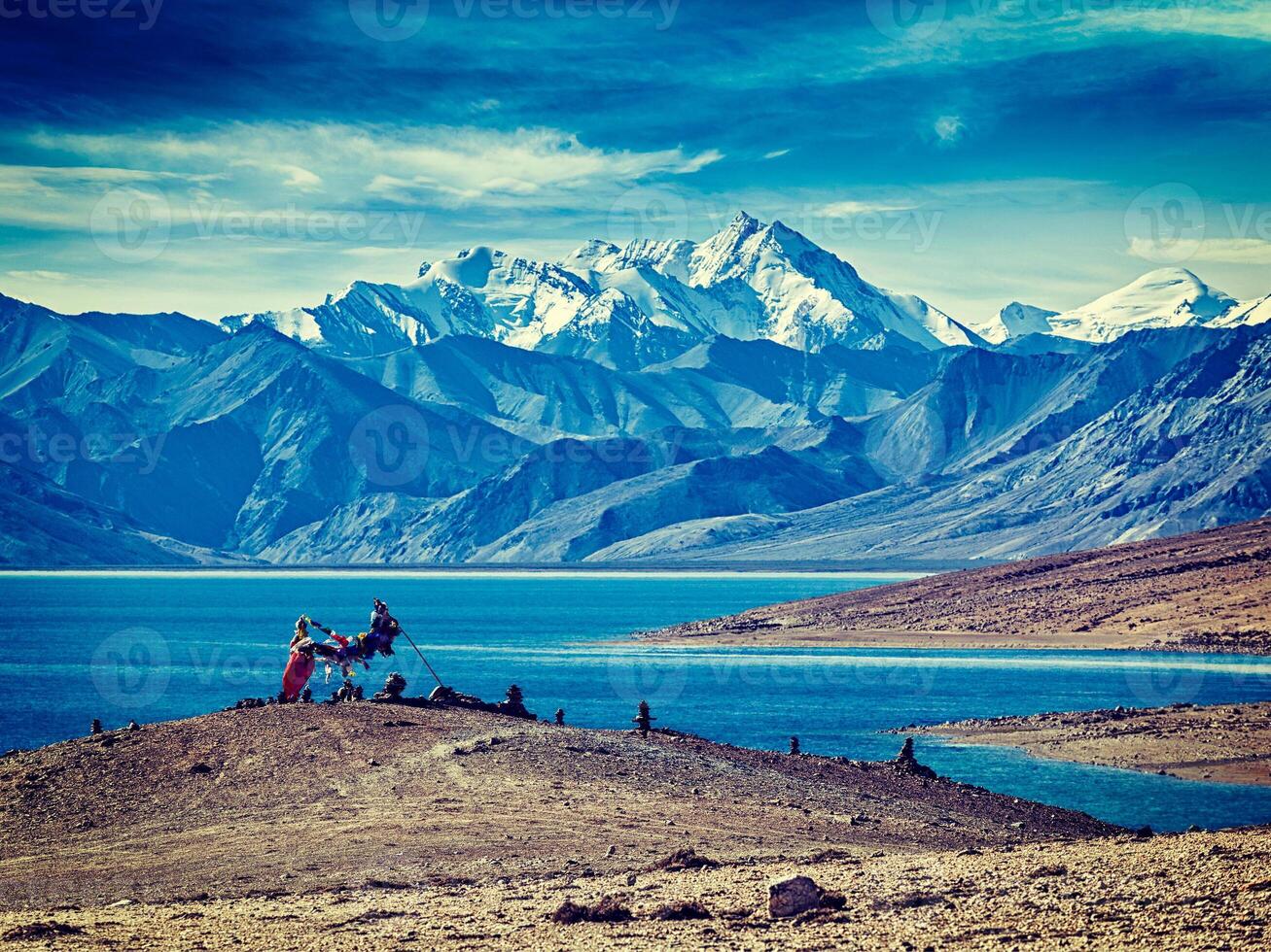 Buddhist prayer flags lungta at Himalayan lake Tso Moriri photo