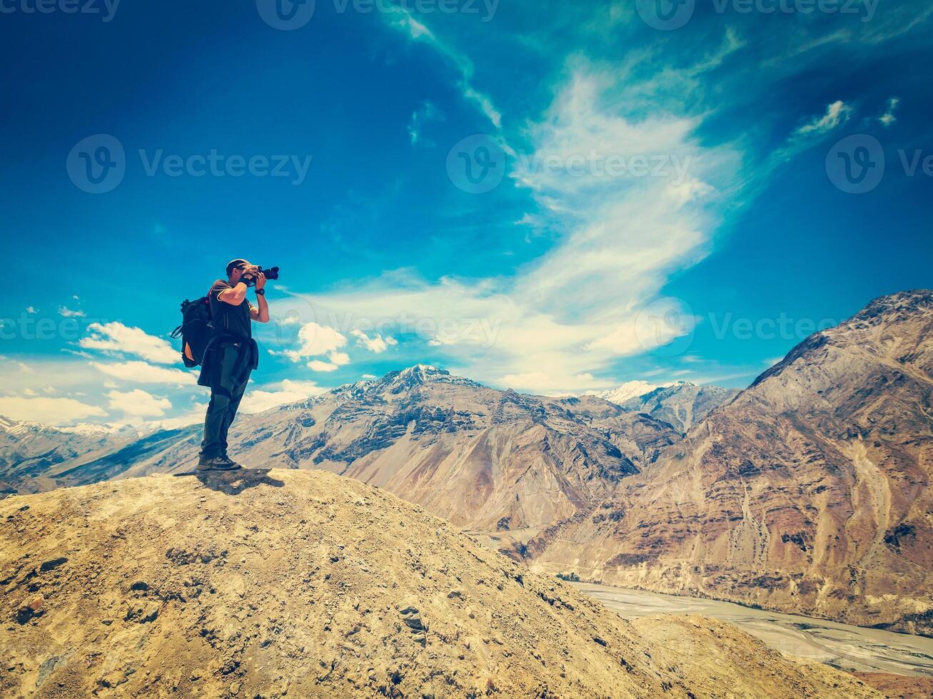 Photographer taking photos in Himalayas