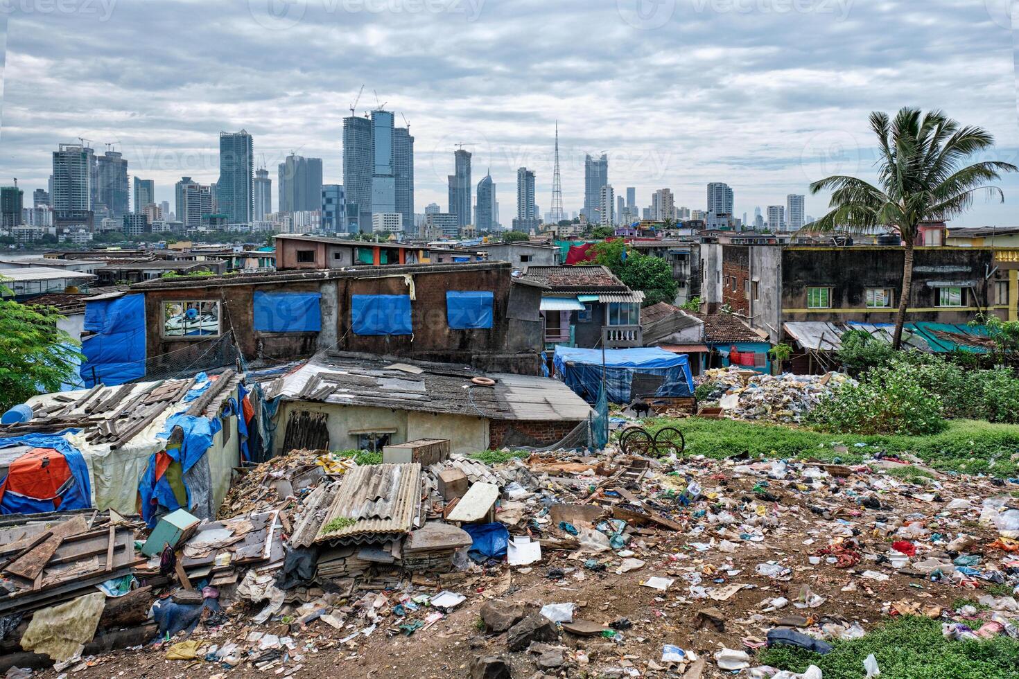 View of Mumbai skyline over slums in Bandra suburb photo