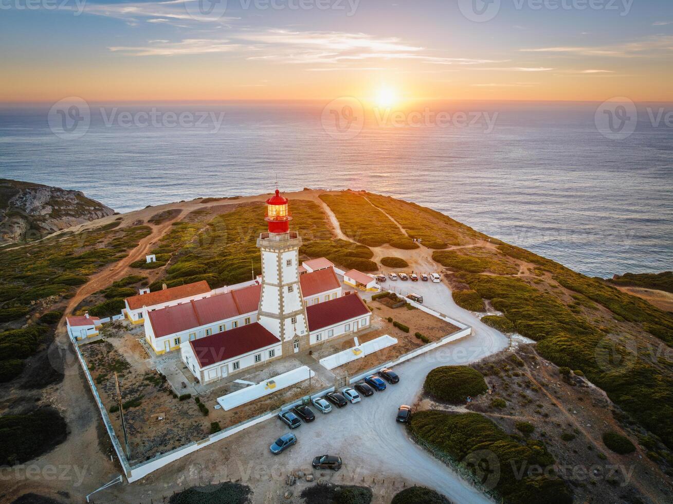 Lighthouse on Cabo Espichel cape Espichel on Atlantic ocean photo