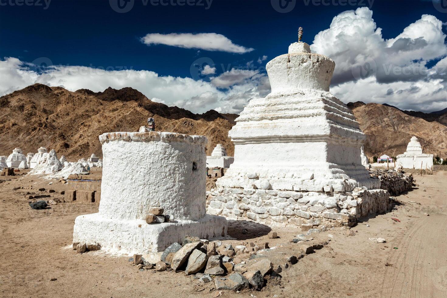 White chortens stupas near Shey, Ladakh, India photo