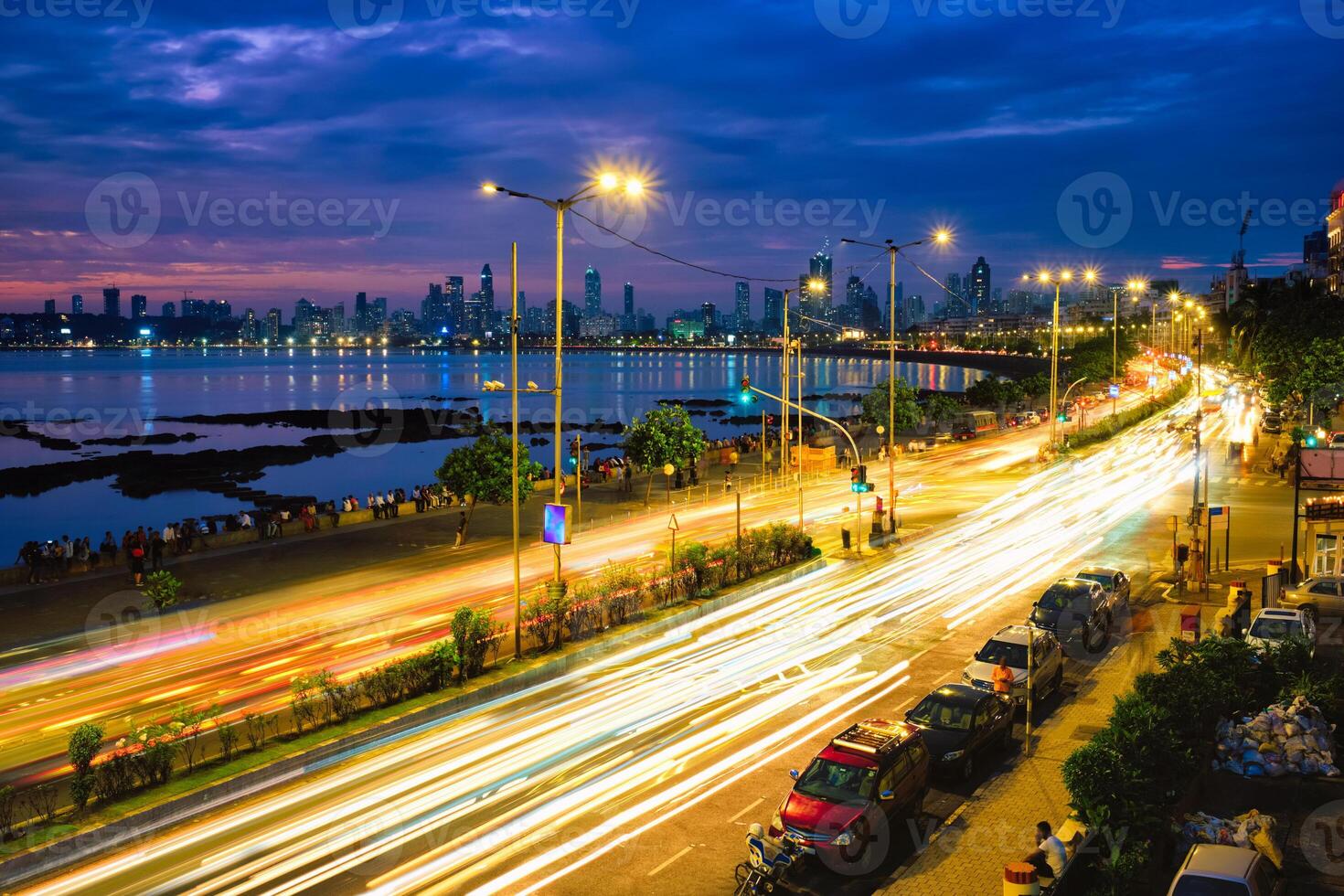 Marine drive in the night with car light trails. Mumbai, Maharashtra, India photo