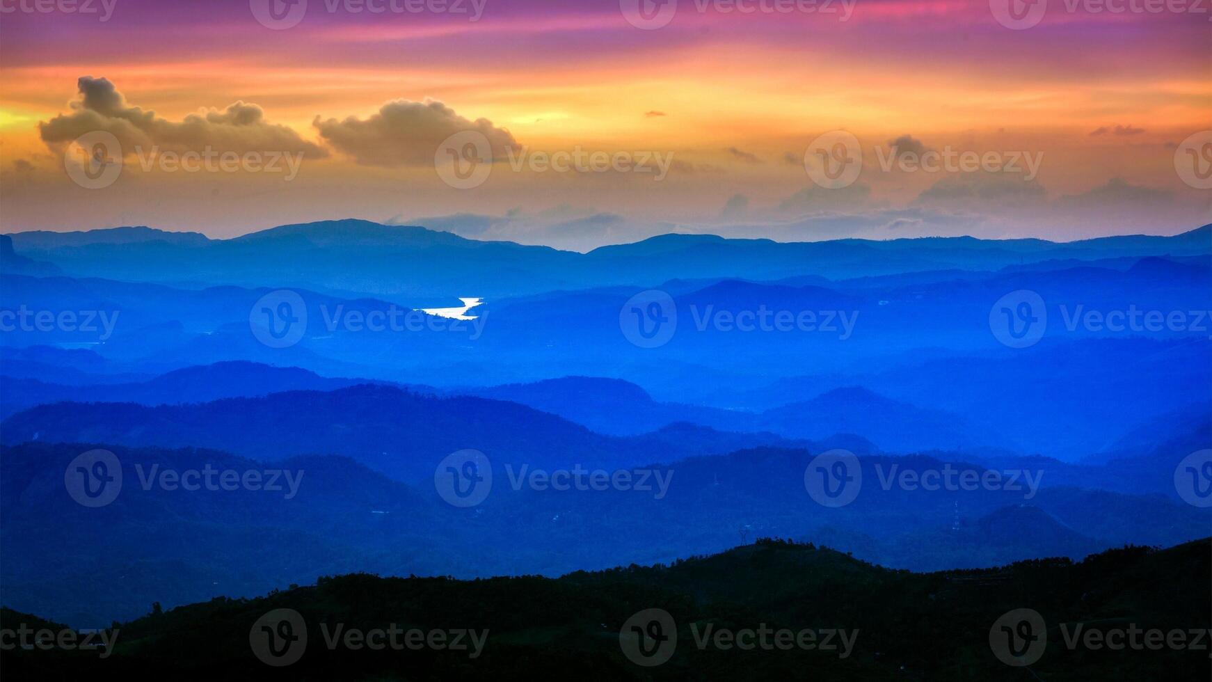Sunset in mountains photo