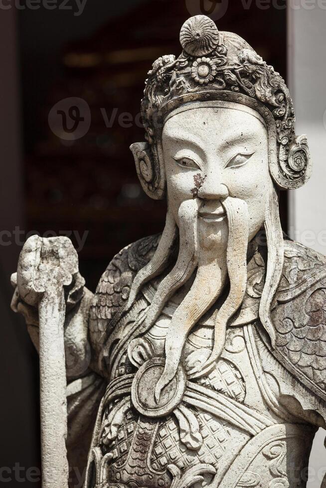 Wat Pho stone guardian statue, Thailand photo