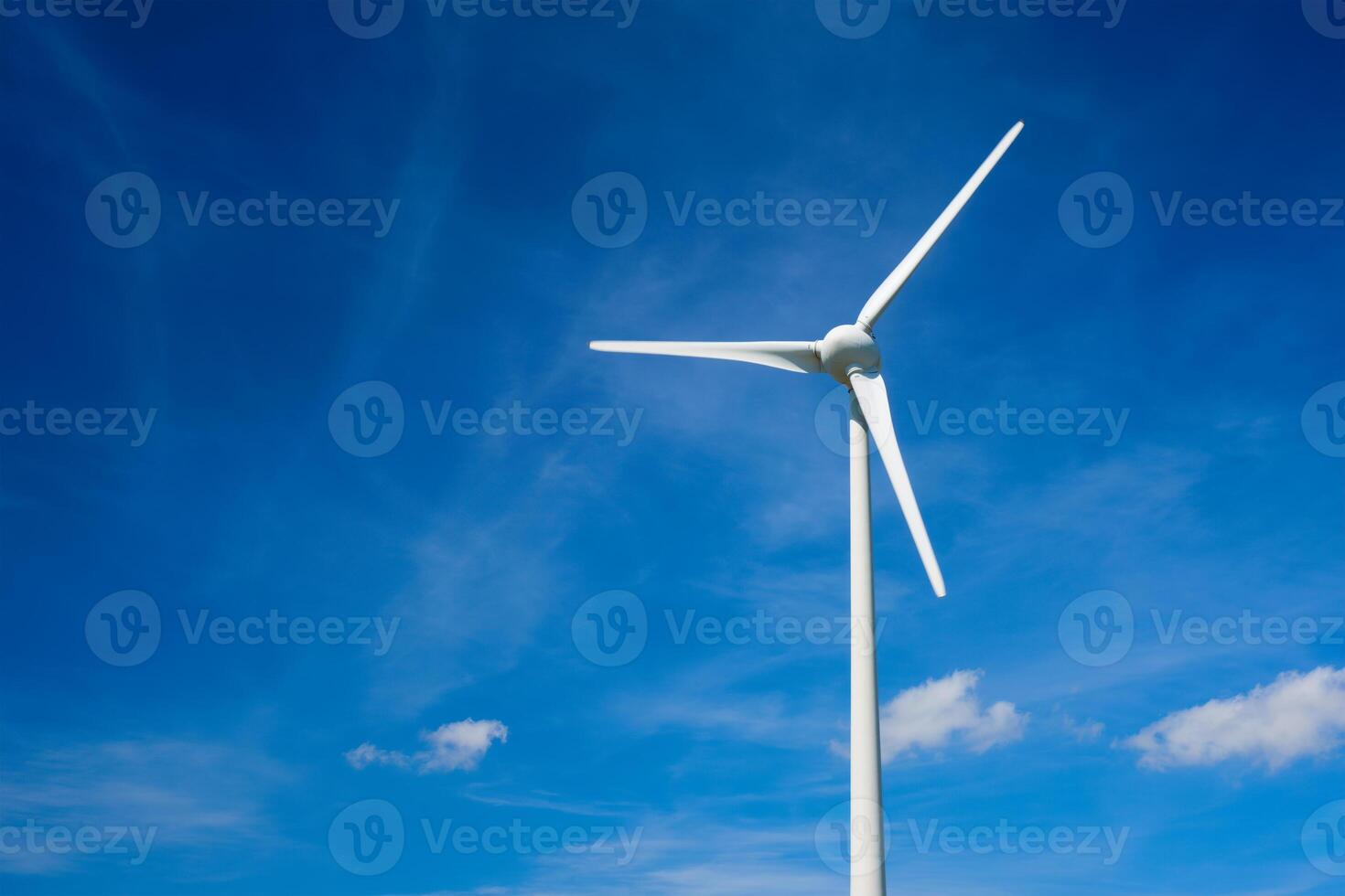 Wind generator turbines in sky photo