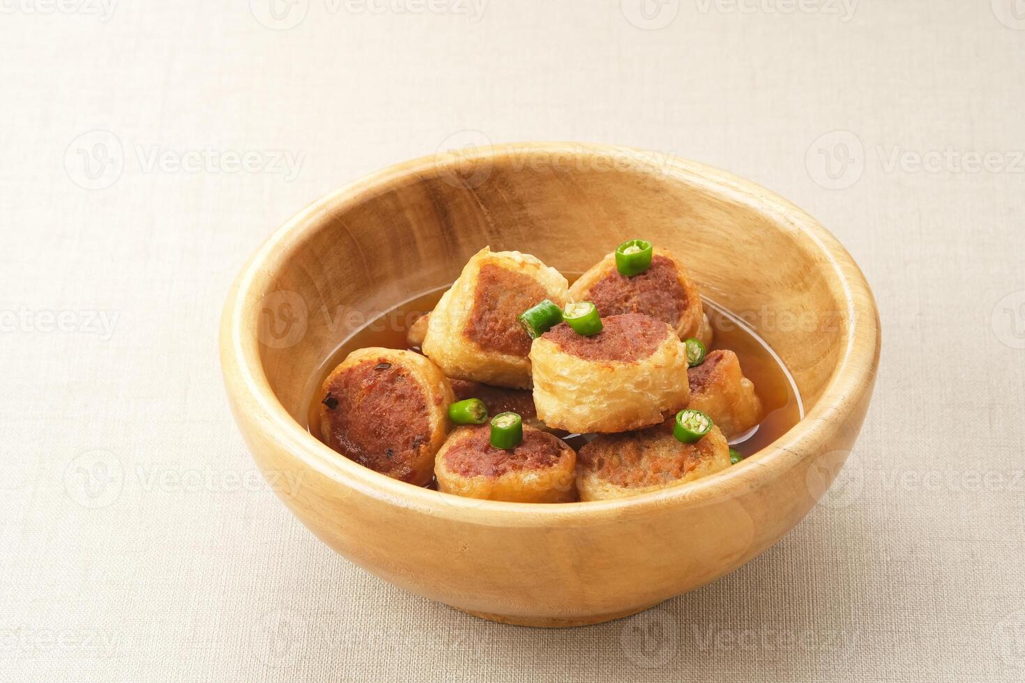 Gohyong or Ngo Hiang, made from minced chicken with flour, served with sour sauce photo