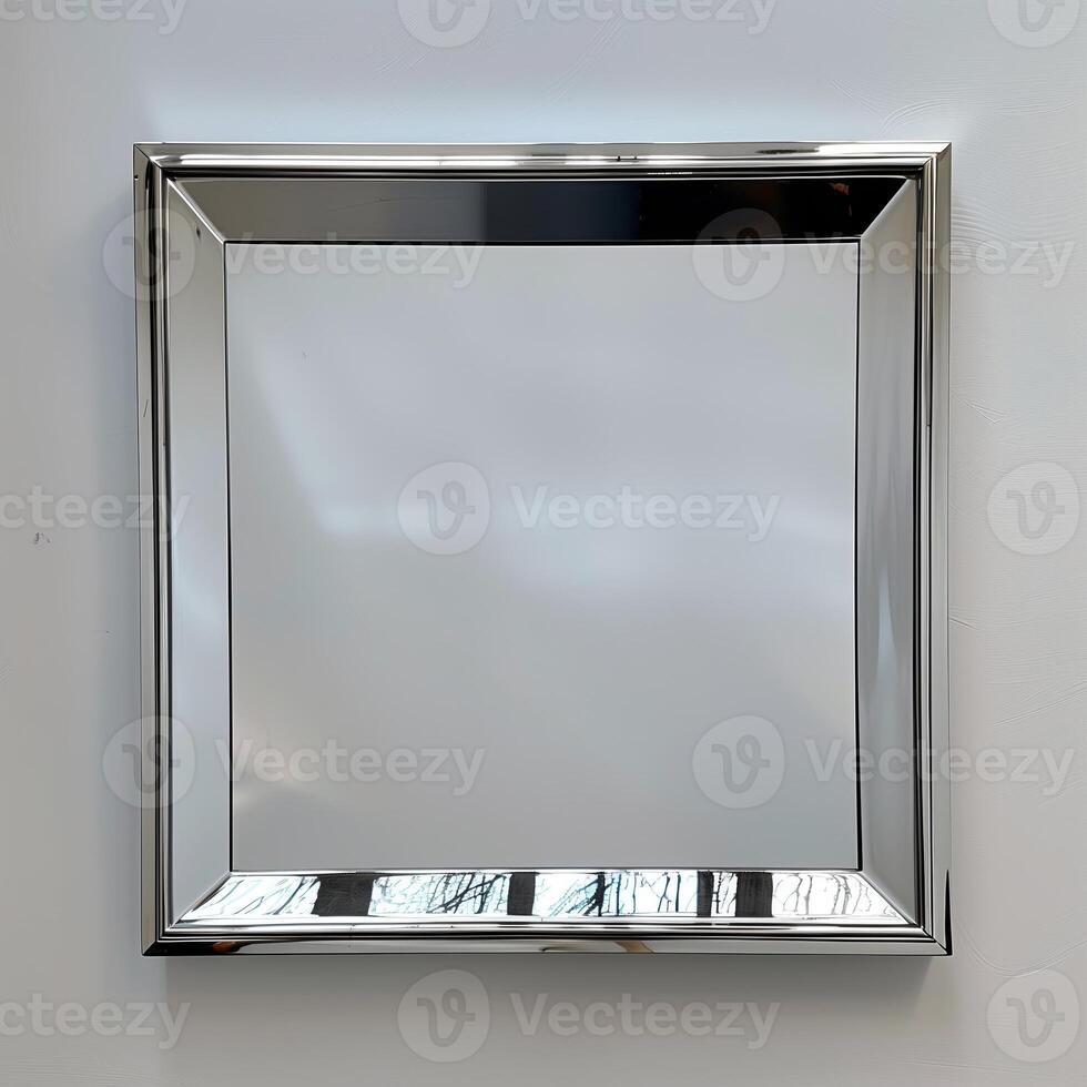 A square mirrored chrome frame with rounded bevel. photo