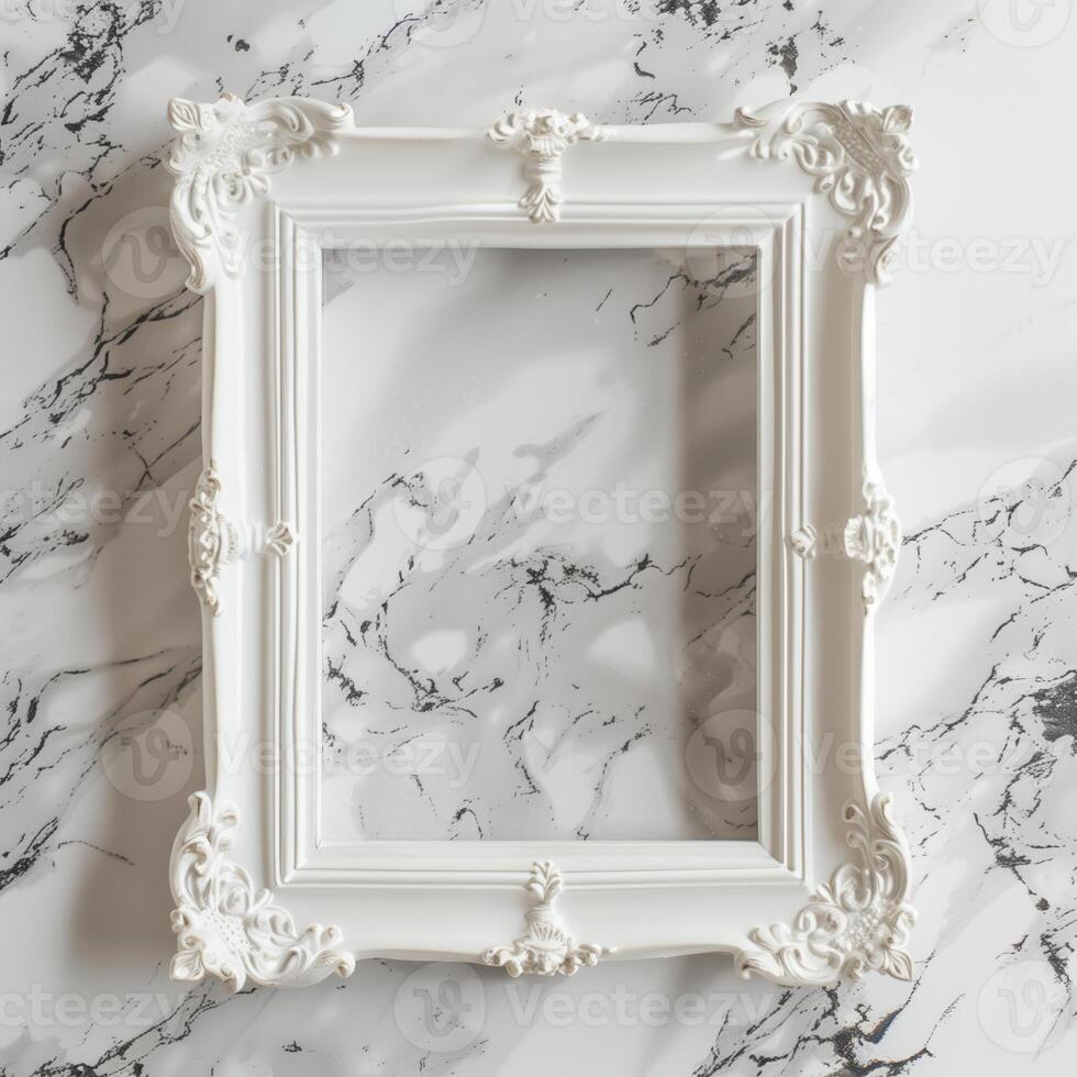 A white picture frame with an empty space inside, sitting on top of a marble surface. photo