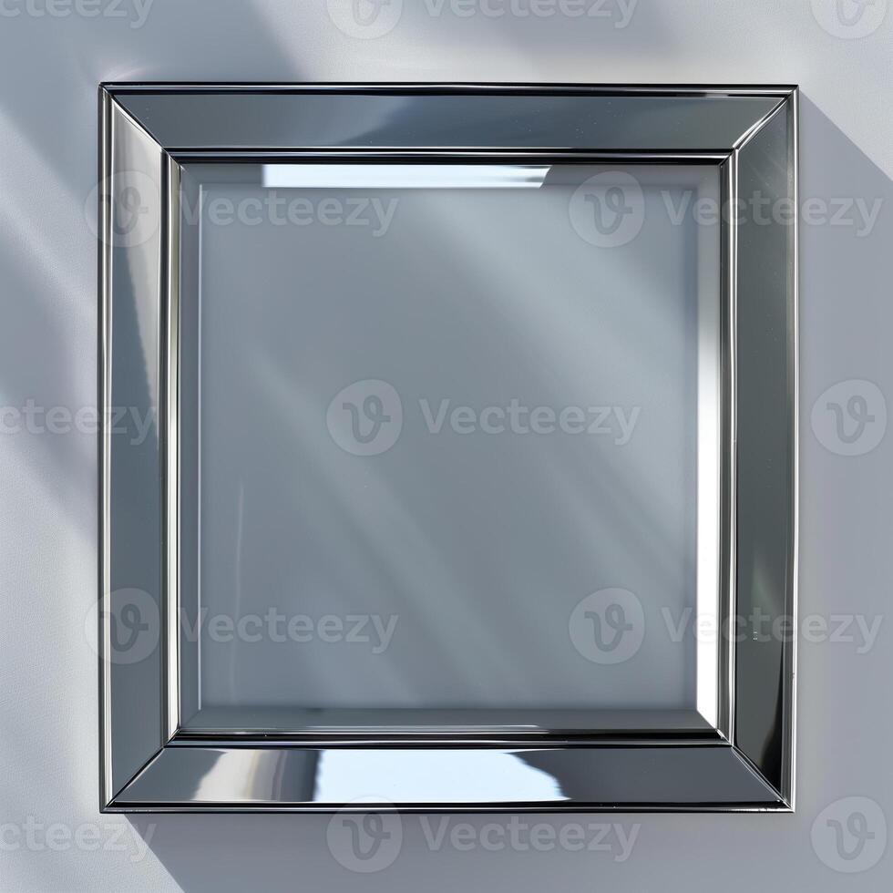 A square mirrored chrome frame with rounded bevel. photo