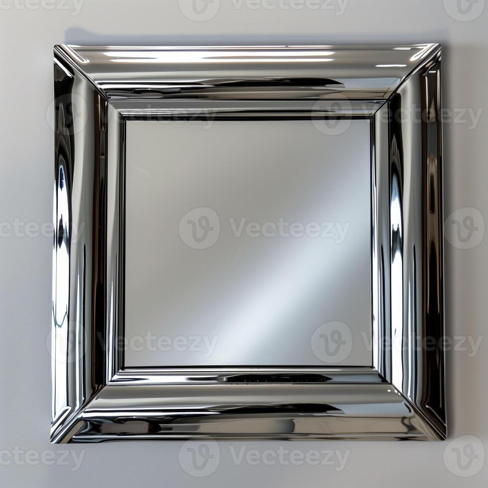 A square mirrored chrome frame with rounded bevel. photo