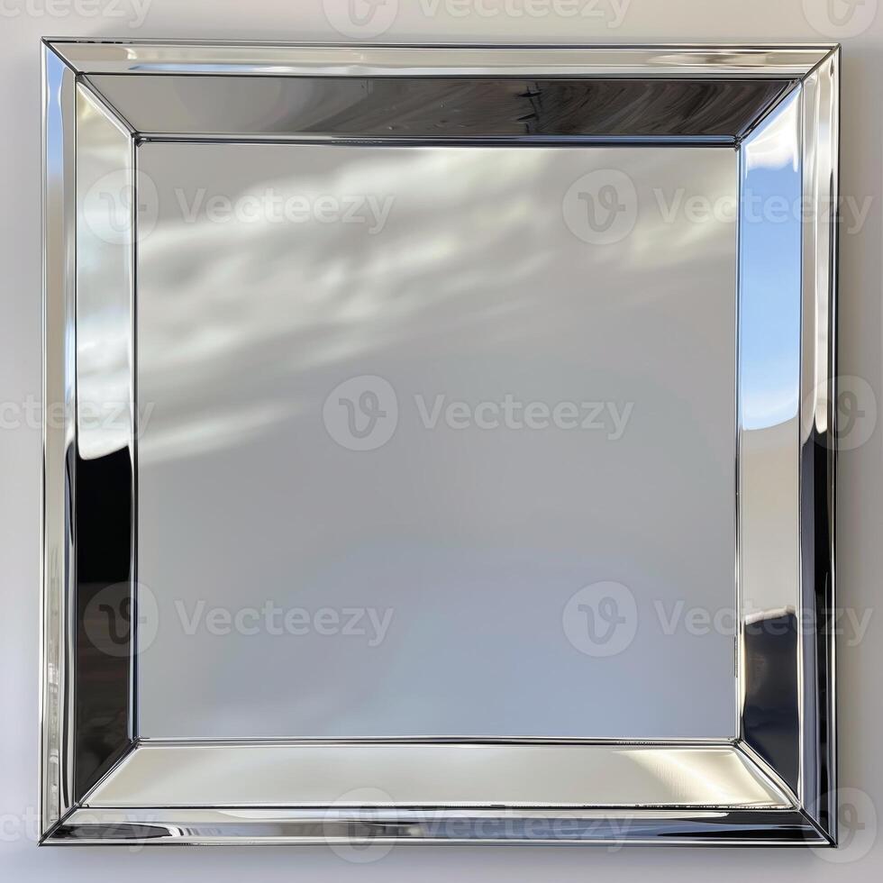 A square mirrored chrome frame with rounded bevel. photo
