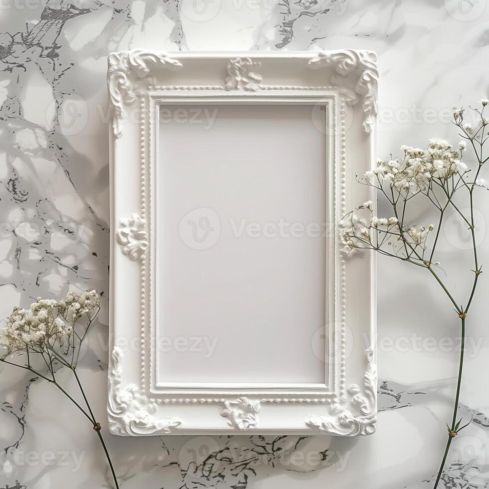 A white picture frame with an empty space inside, sitting on top of a marble surface. photo