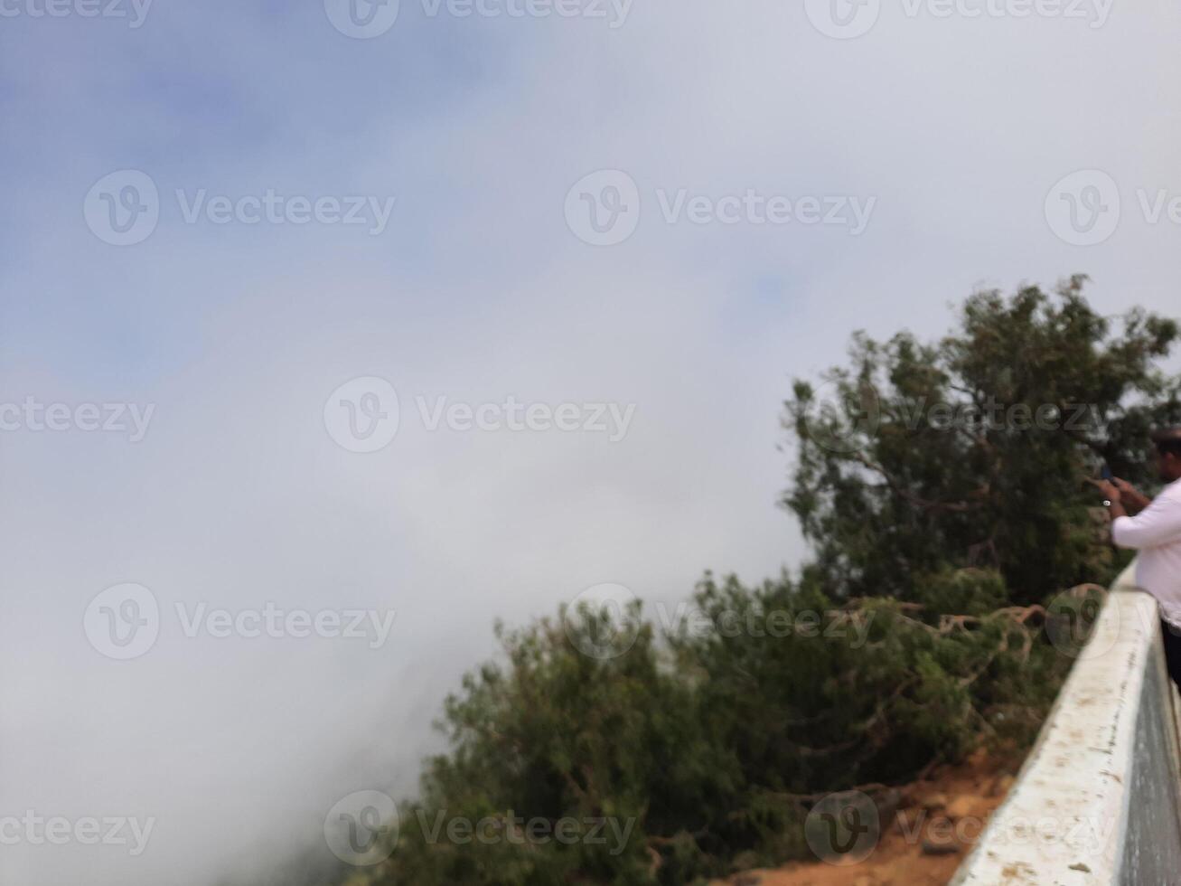 Breathtaking natural beauty of Abha in Saudi Arabia in the summer season. High mountains, greenery, low clouds and fog are the beauty of Abha. photo