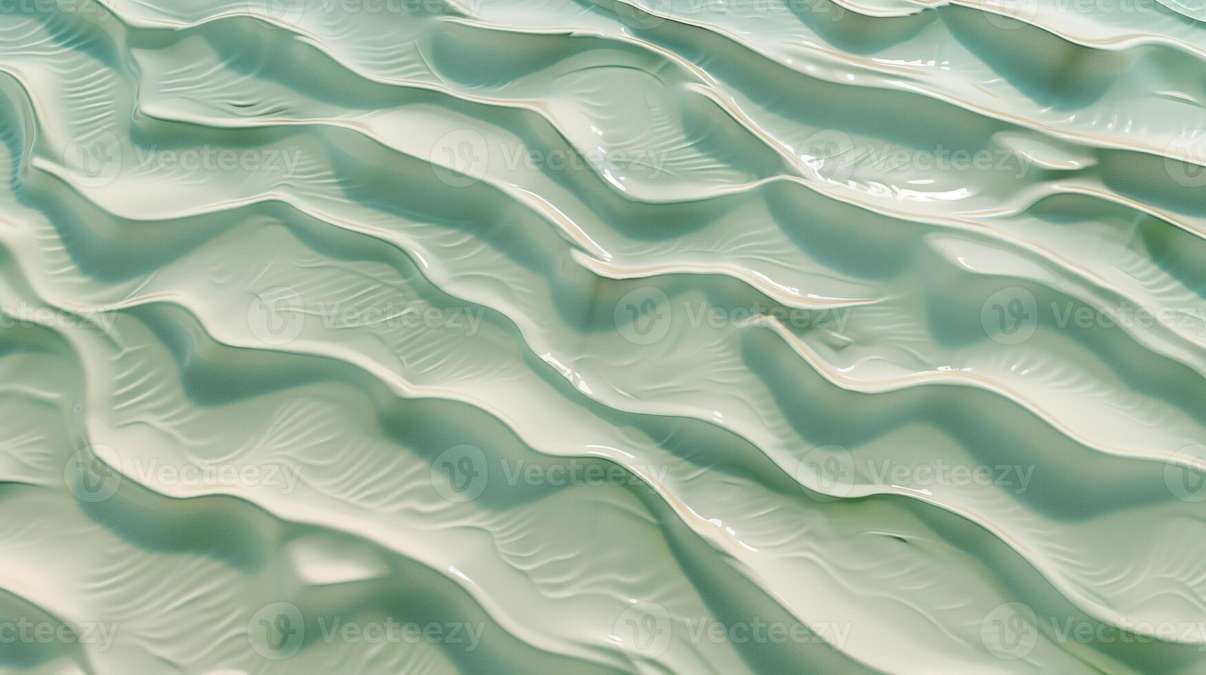 A texture of ripples on sand, with small waves on the surface, light green tint. photo