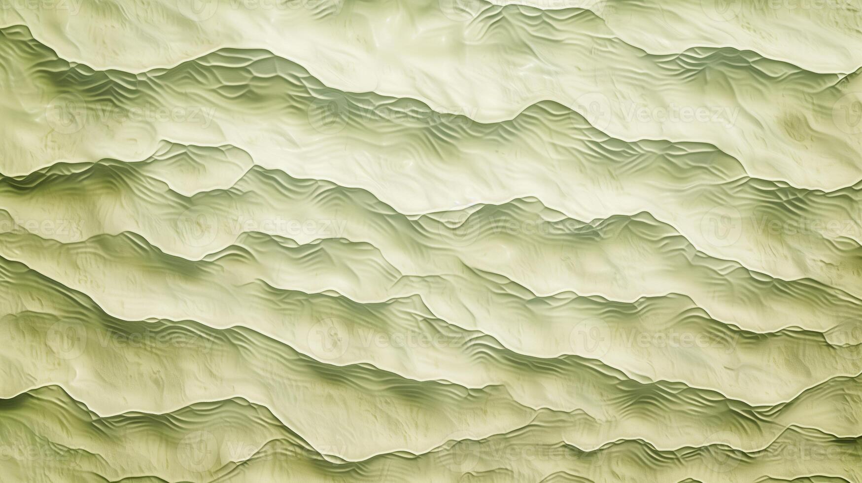 A texture of ripples on sand, with small waves on the surface, light green tint. photo
