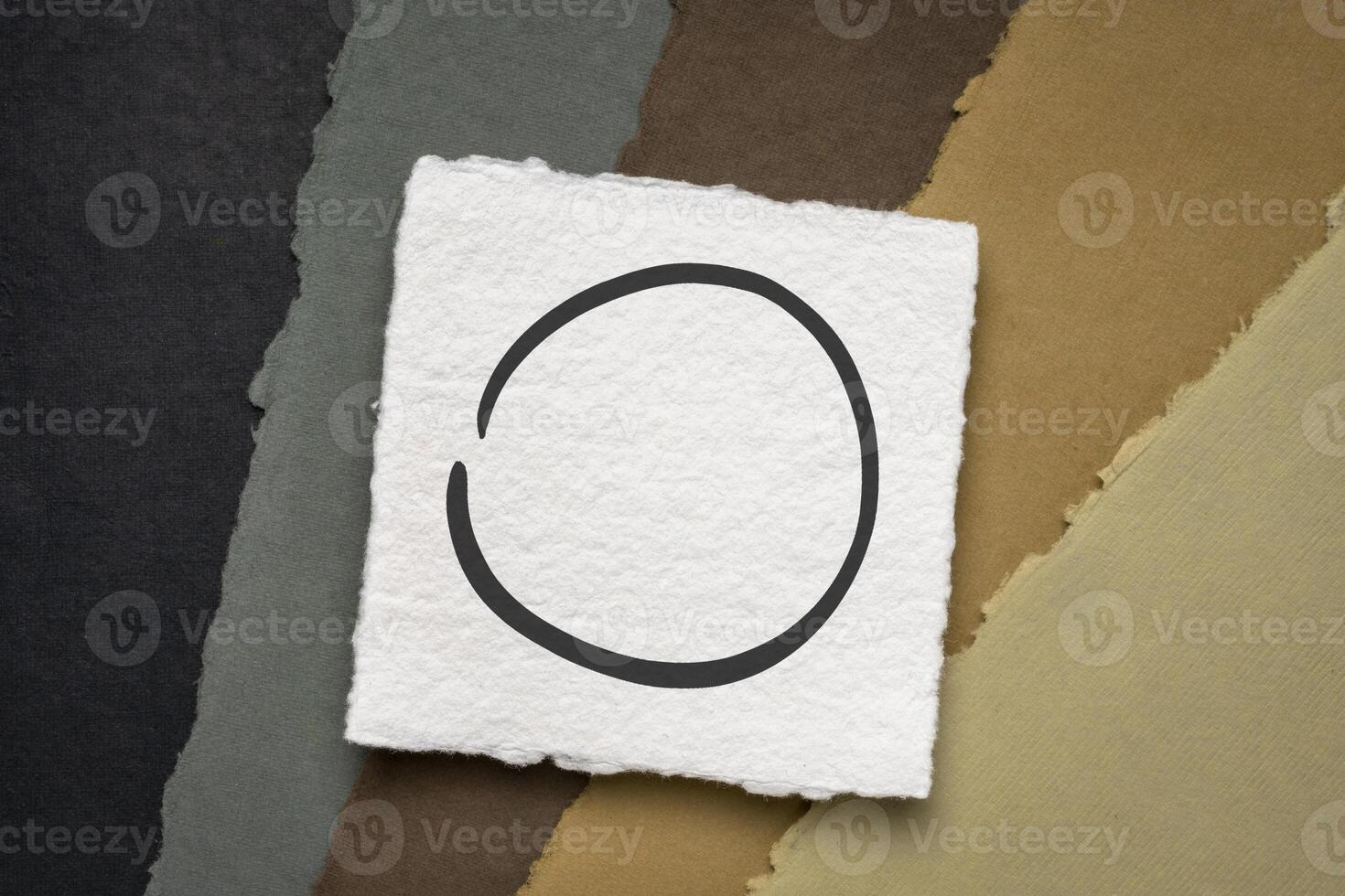 open Japanese enso symbol on white handmade paper photo