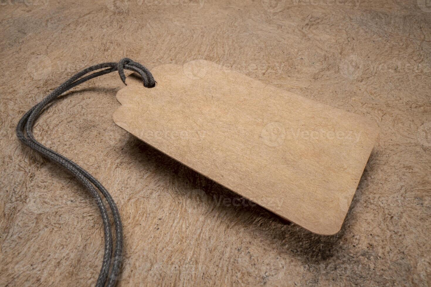 blank paper price tag with a twine photo