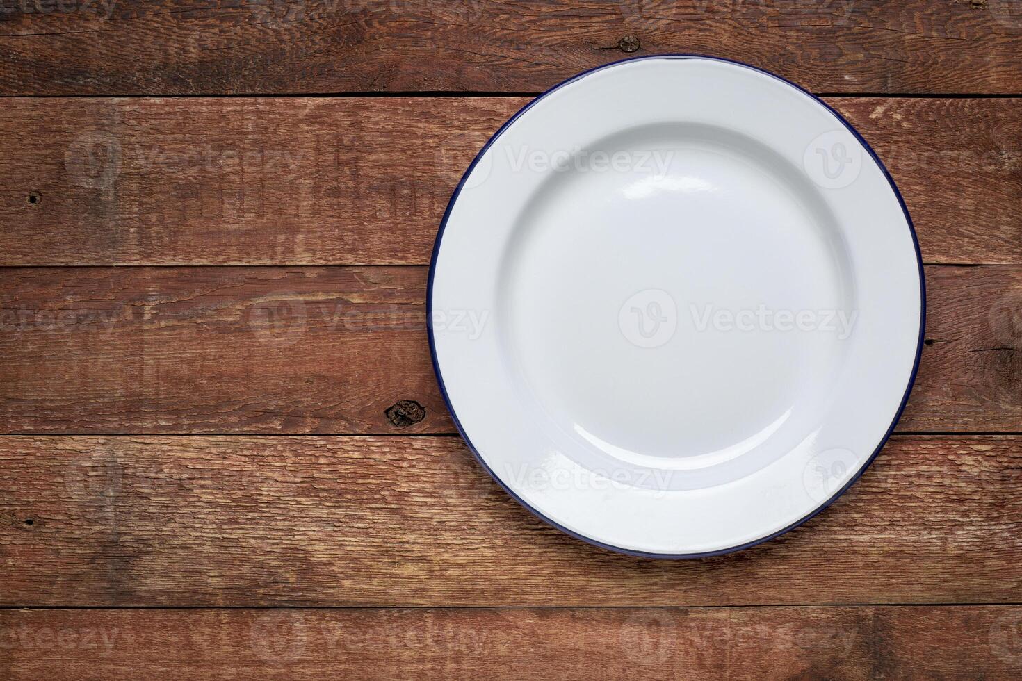empty white metal enamel plate photo